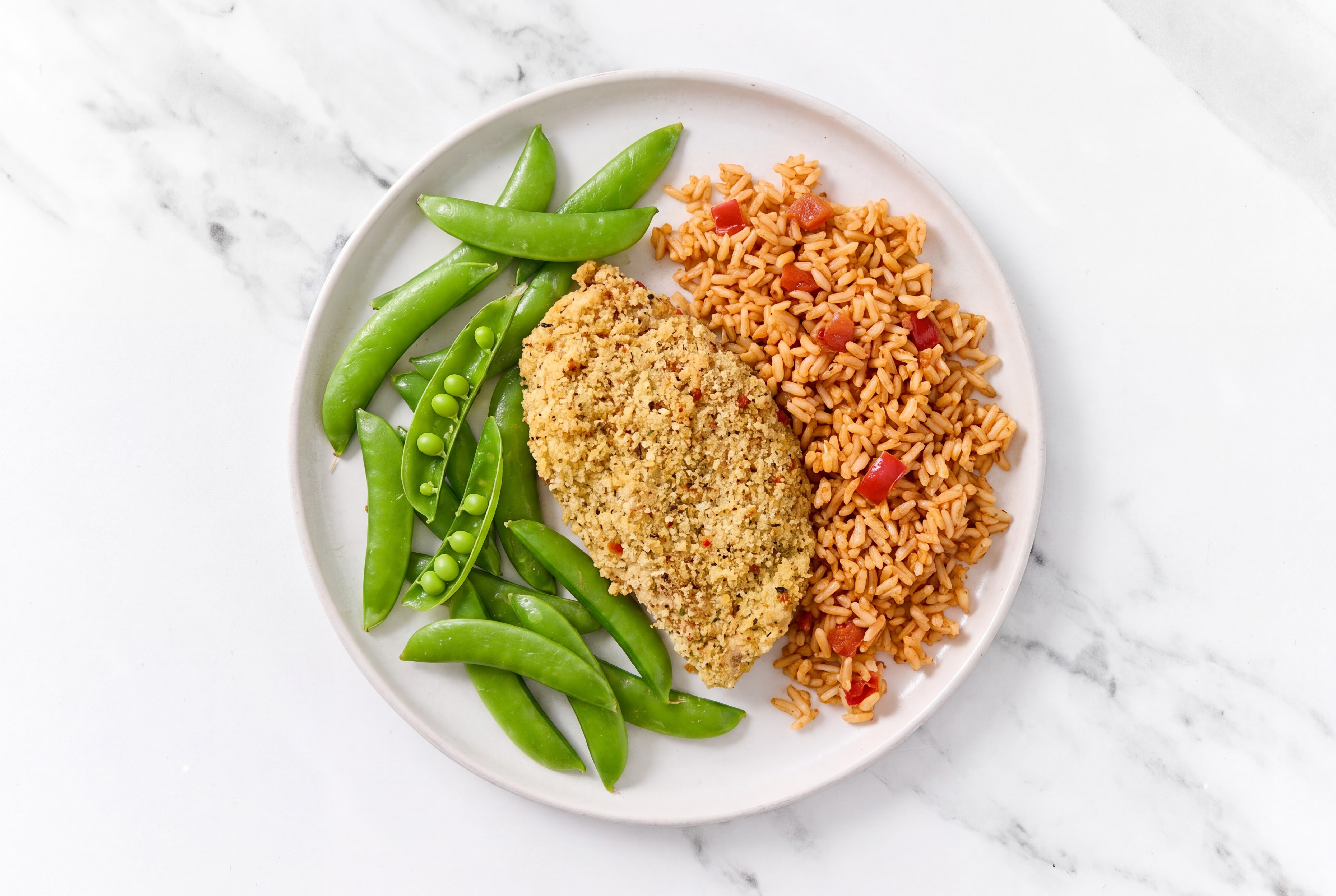 Parmesan Breaded Chicken Cutlet with Snap Peas & Mexican Rice