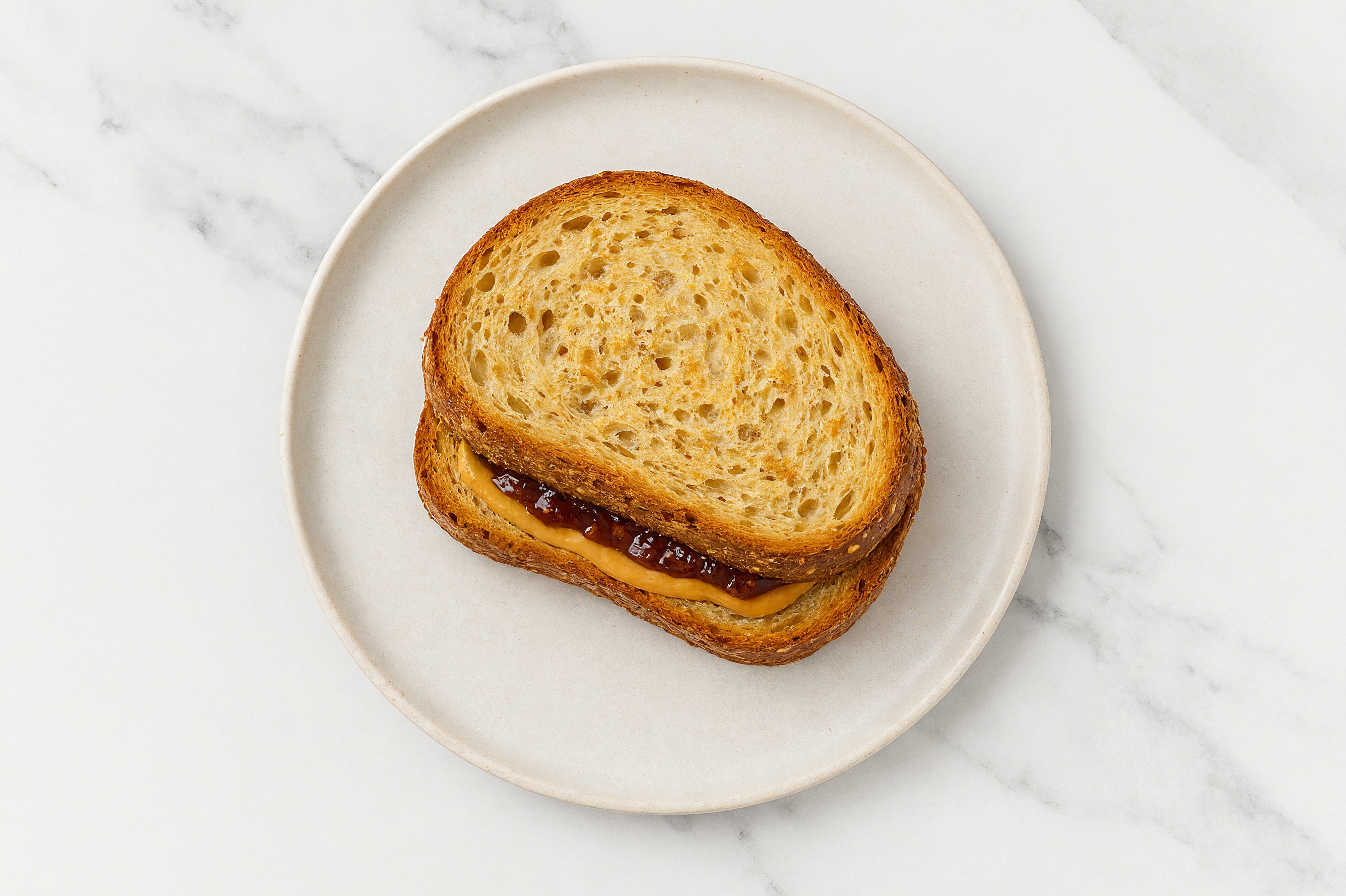 Peanut Butter + Strawberry Jam Multgrain Sourdough Sandwich