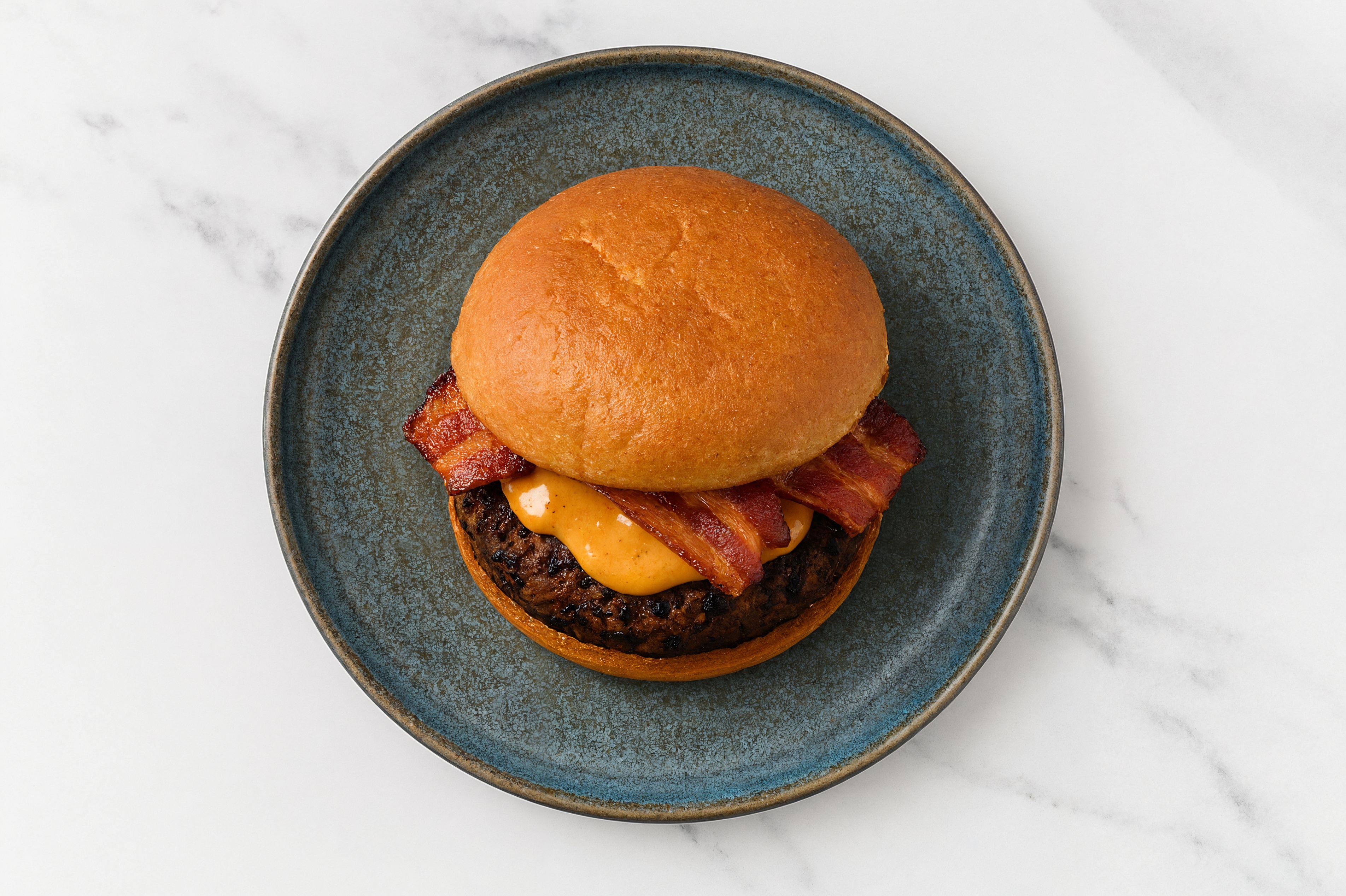 Bacon Black Bean Burger on GF Bun with Smoky BBQ Sauce