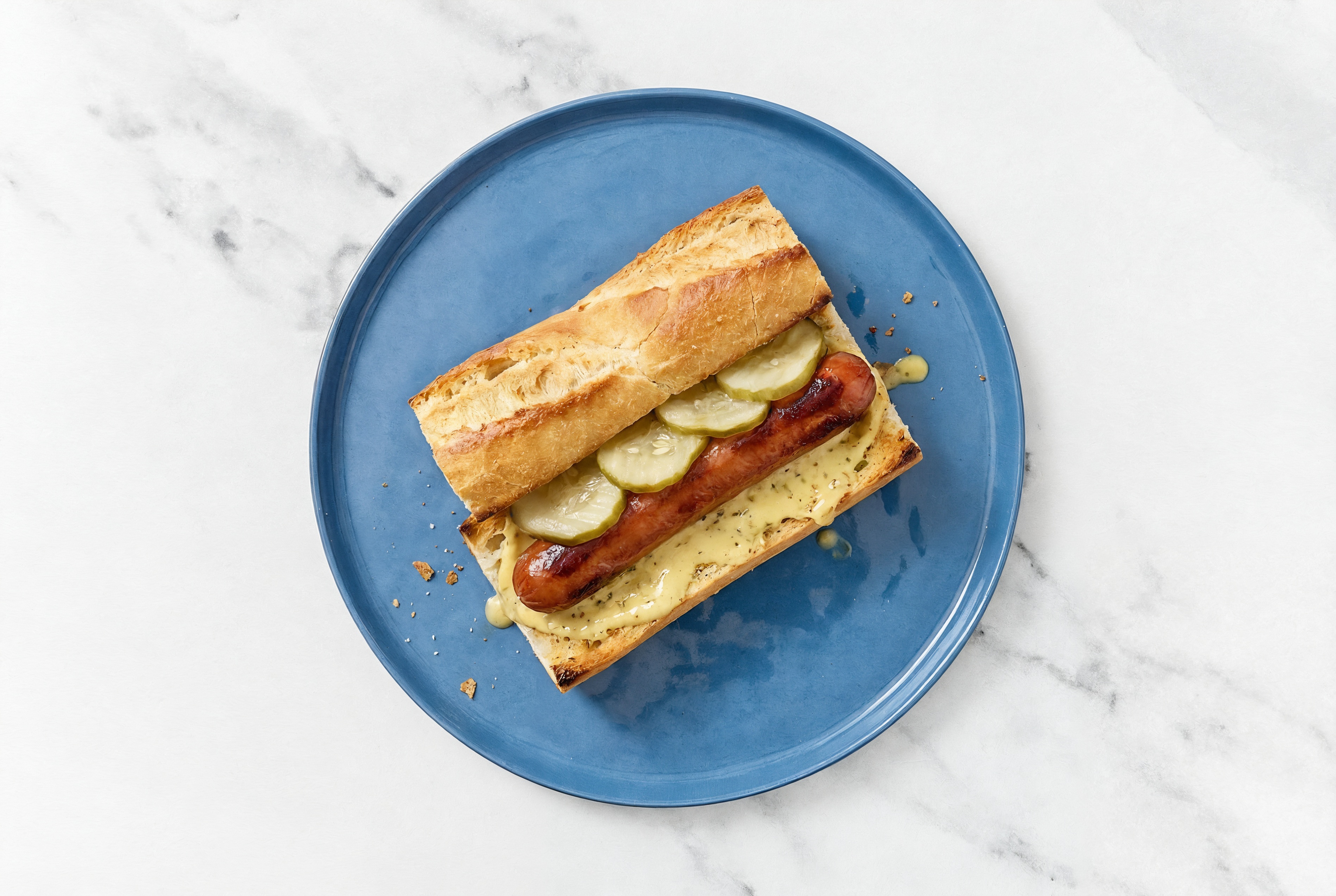 Pickle Beef Hot Dog with Honey Musard Garlic Sauce on Baguette
