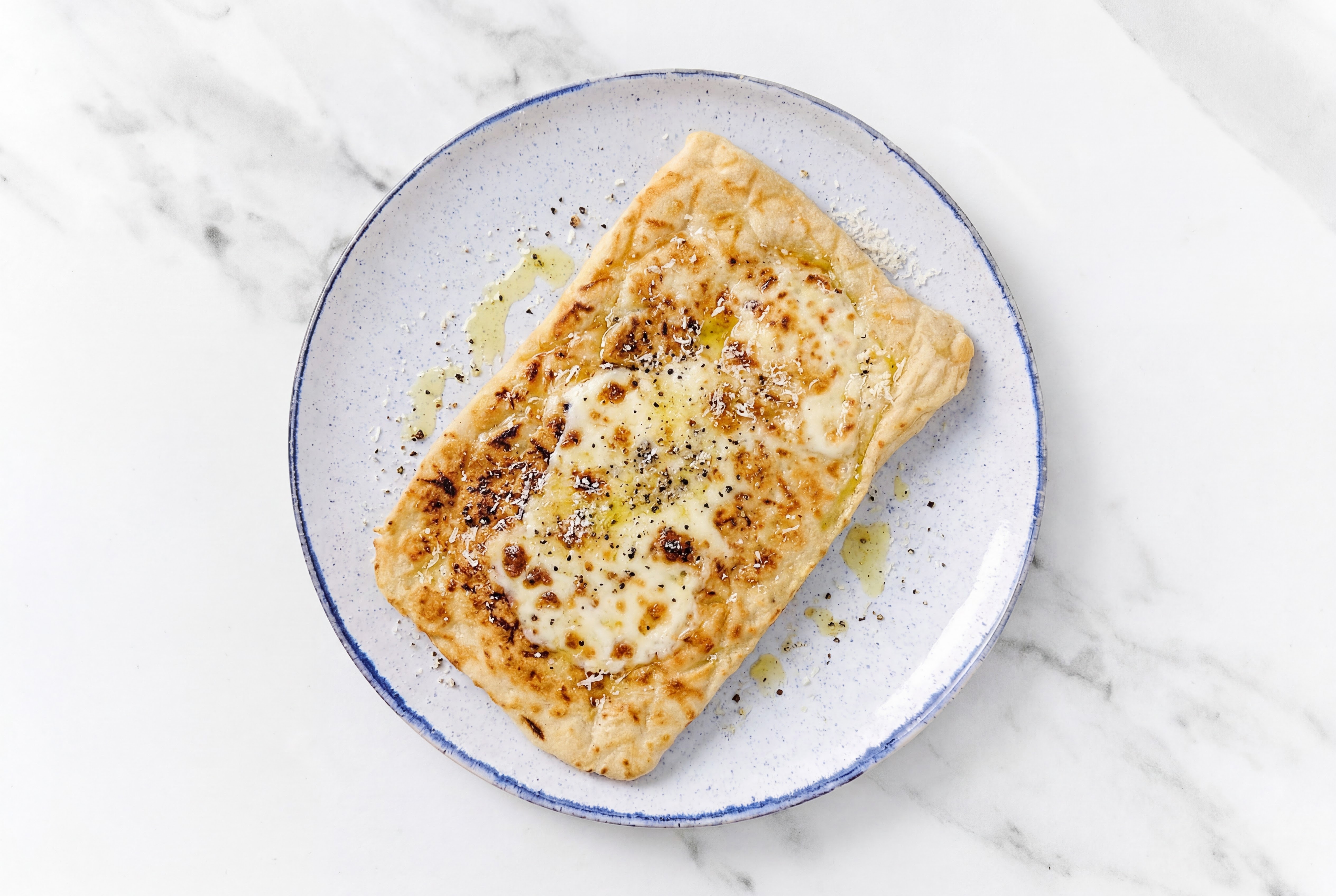 Cacio e Pepe Pizza with Mozzarella Bar