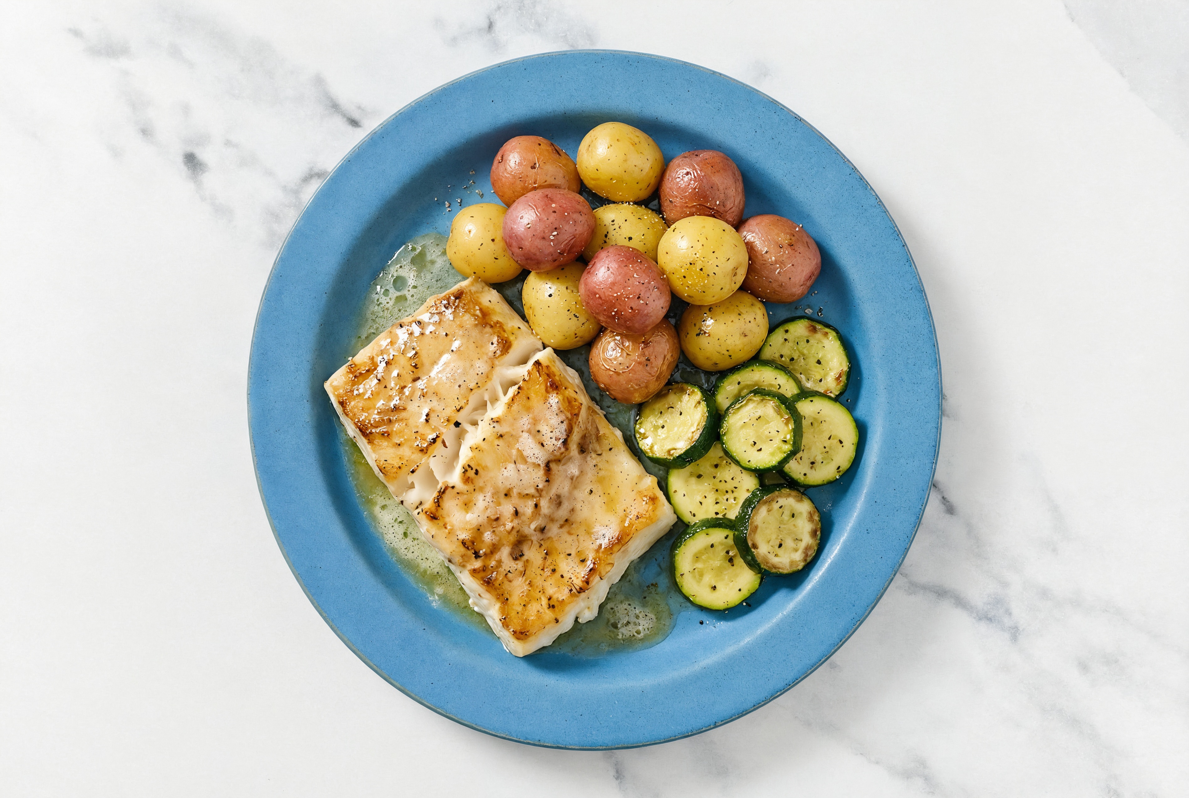 Lemon-Butter Barramundi with Creamer Potatoes & Zucchini