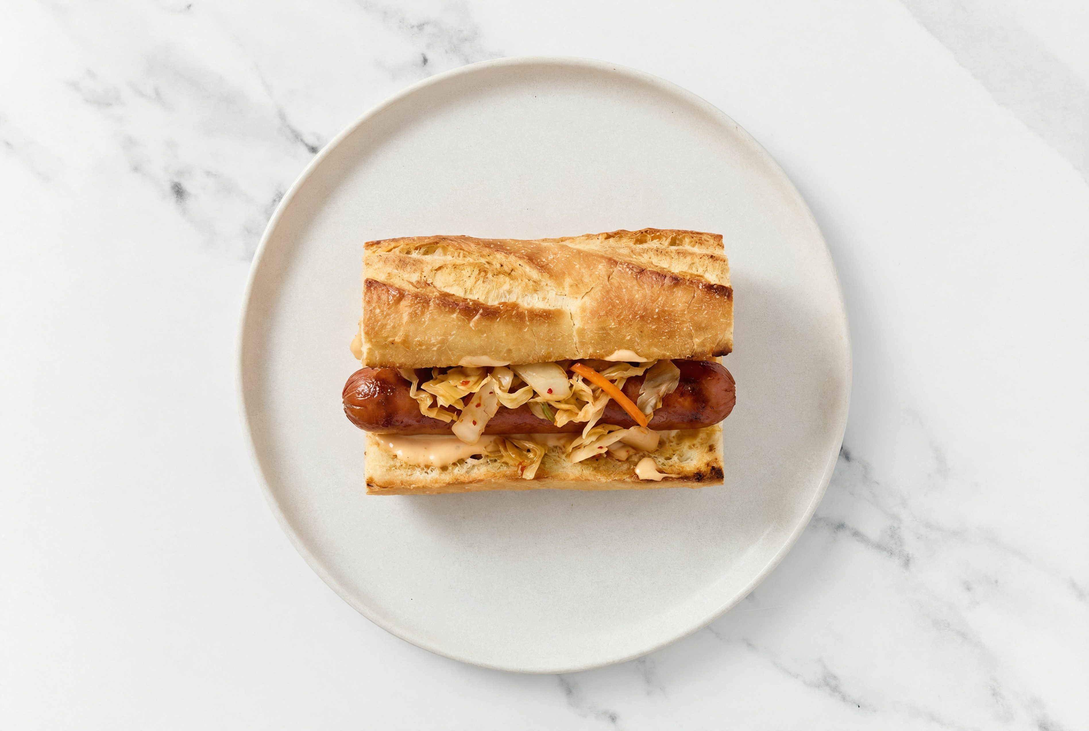 Kimchi Beef Hot Dog with Awesome Sauce on Baguette