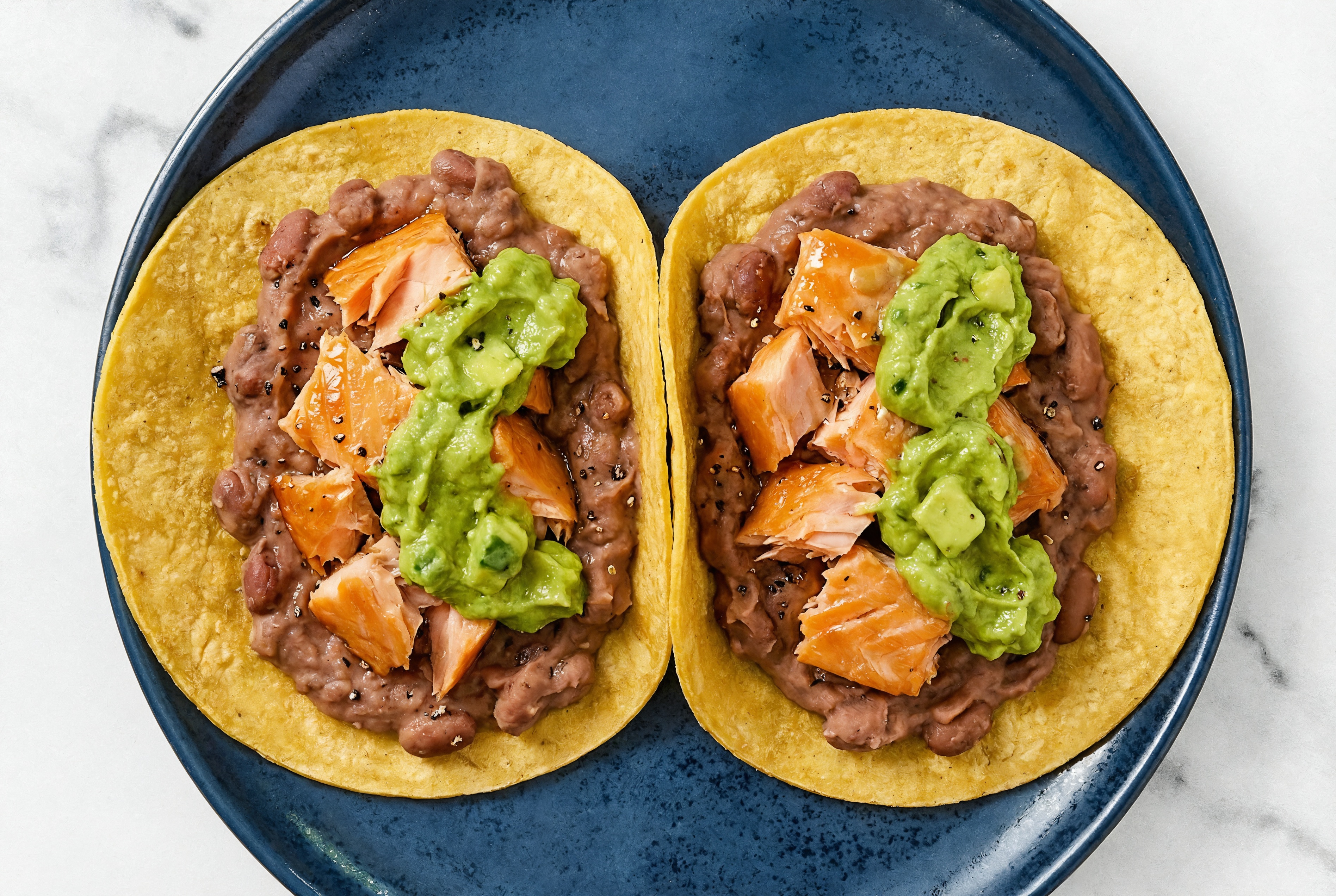 Herby Refried Red Bean Tacos with Smoked Salmon & Guacamole
