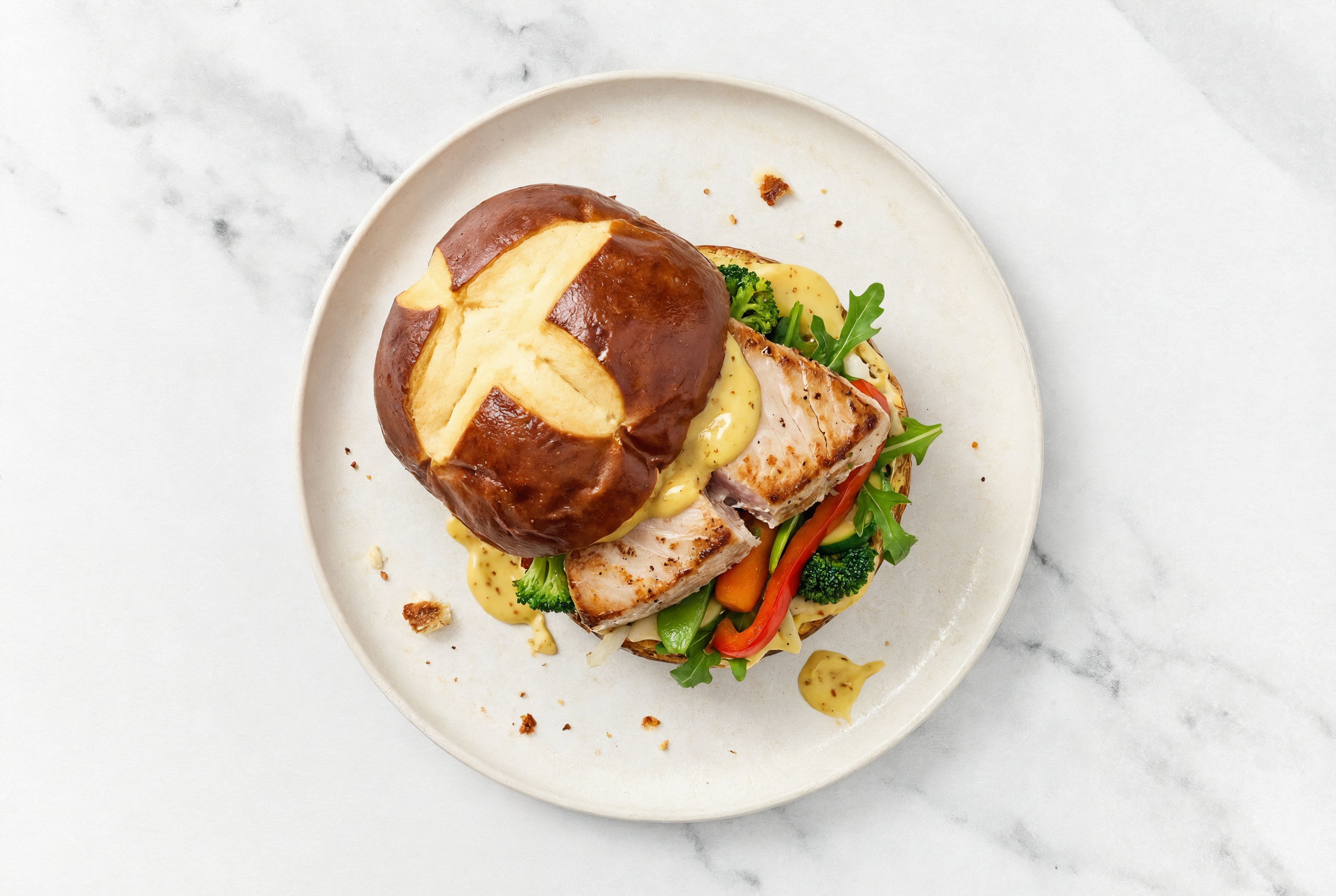 Honey Mustard Tuna Sandwich on Pretzel Bun with Arugula + Mixed Veggies
