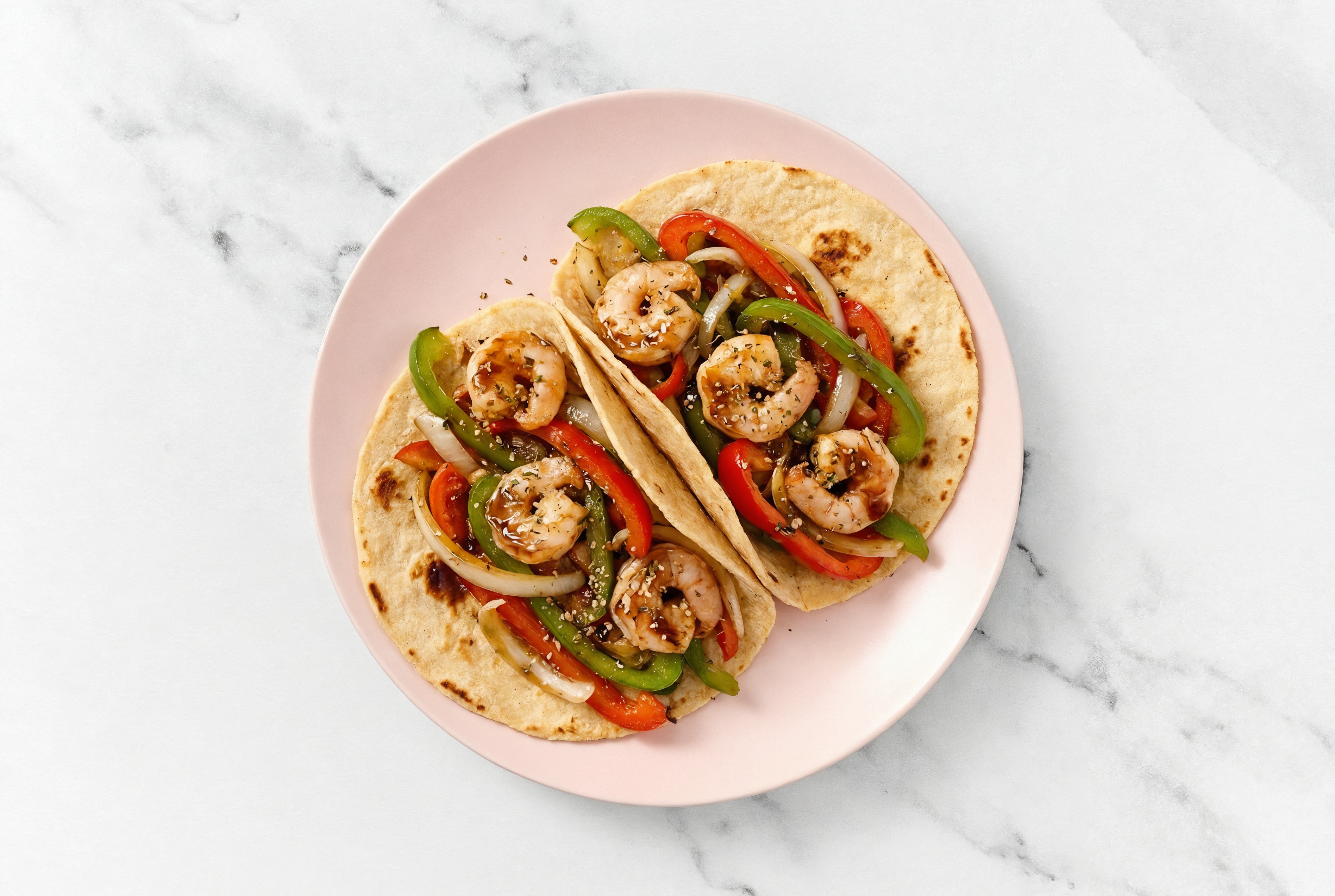 Herby Japanese BBQ Shrimp Tacos with Bell Pepper Onion Saute