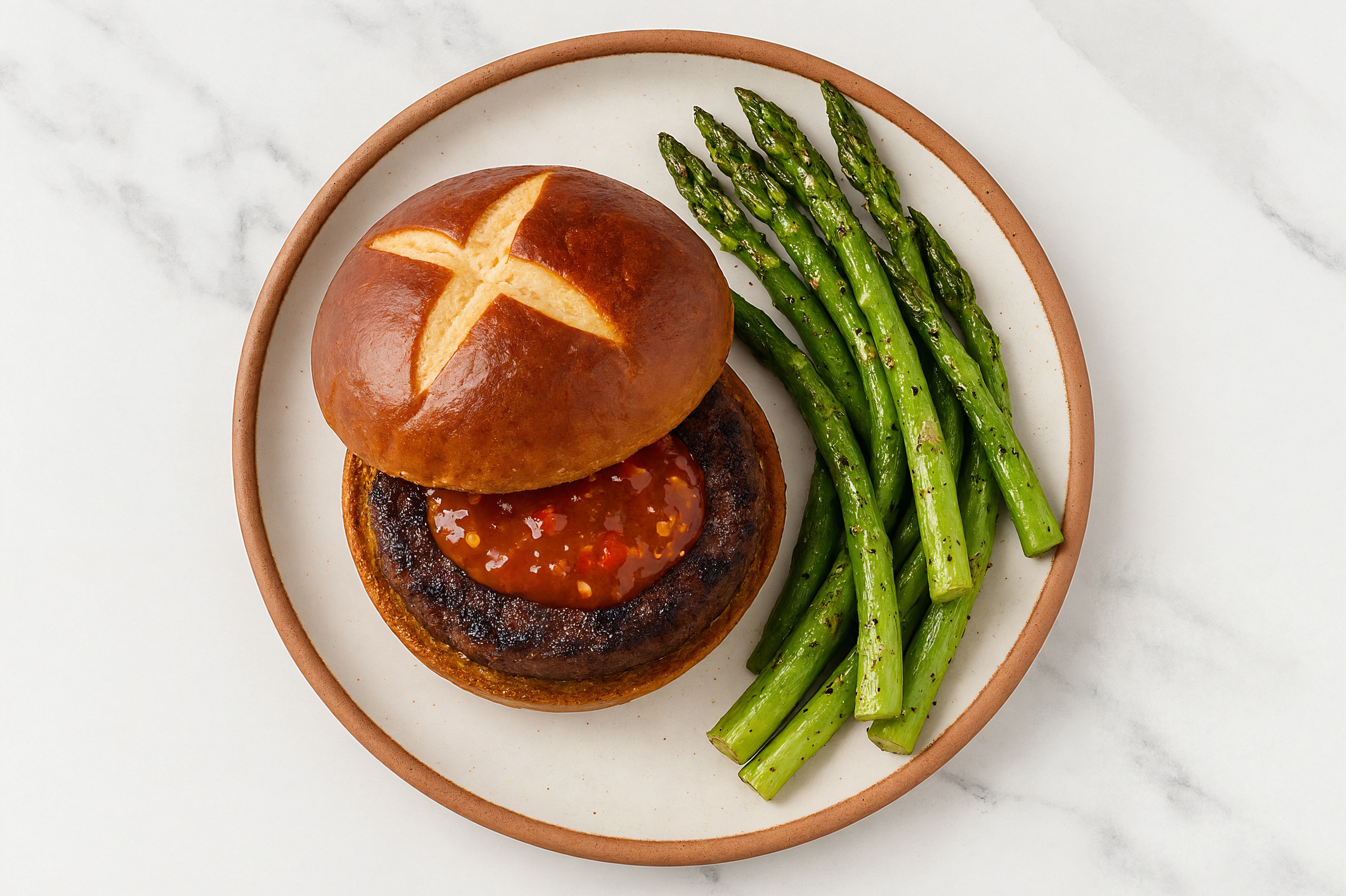 Sweet Chili Beyond Burger on Pretzel Bun
