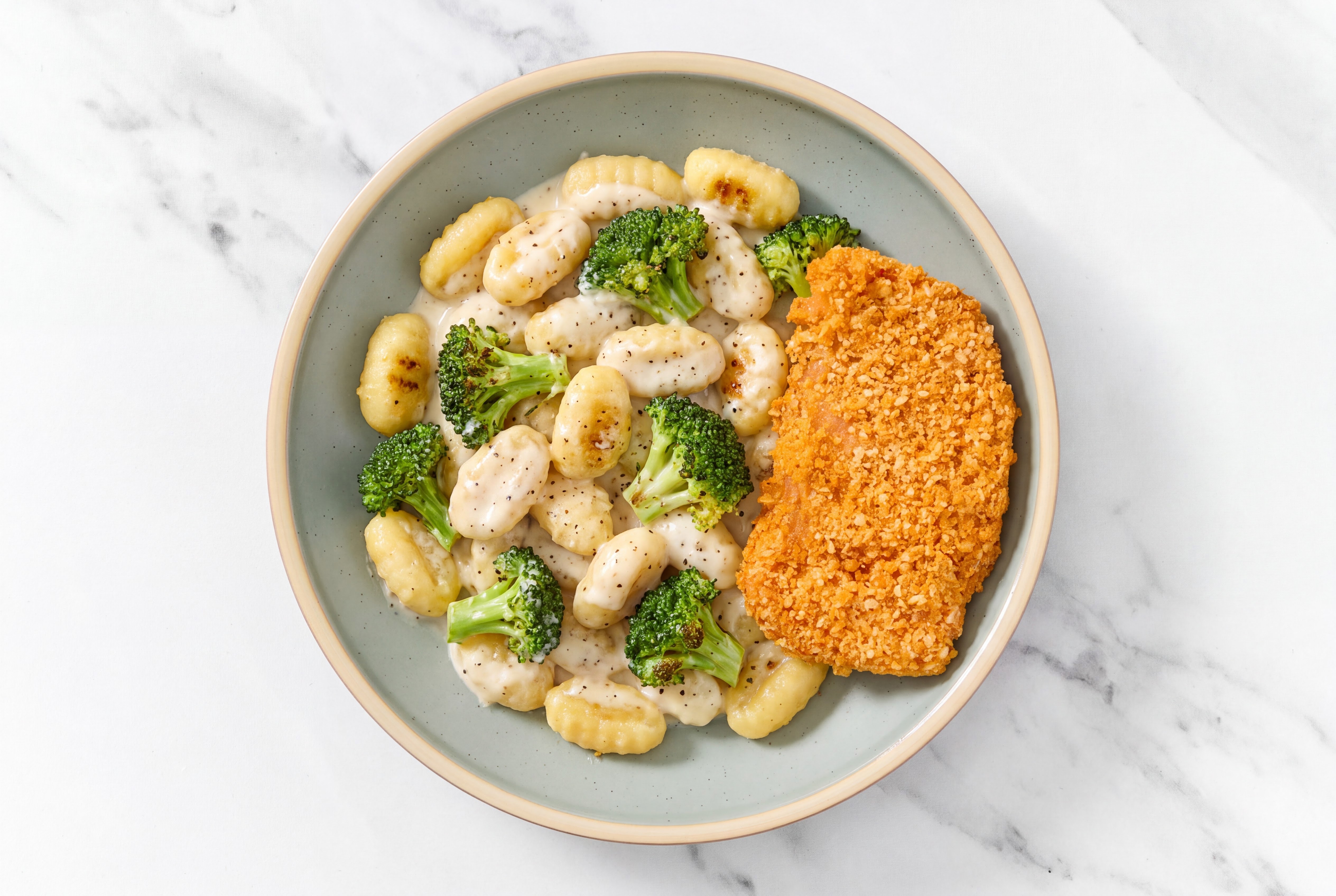 Crispy Hot Honey Chicken over Alfredo Gnocchi with Broccoli