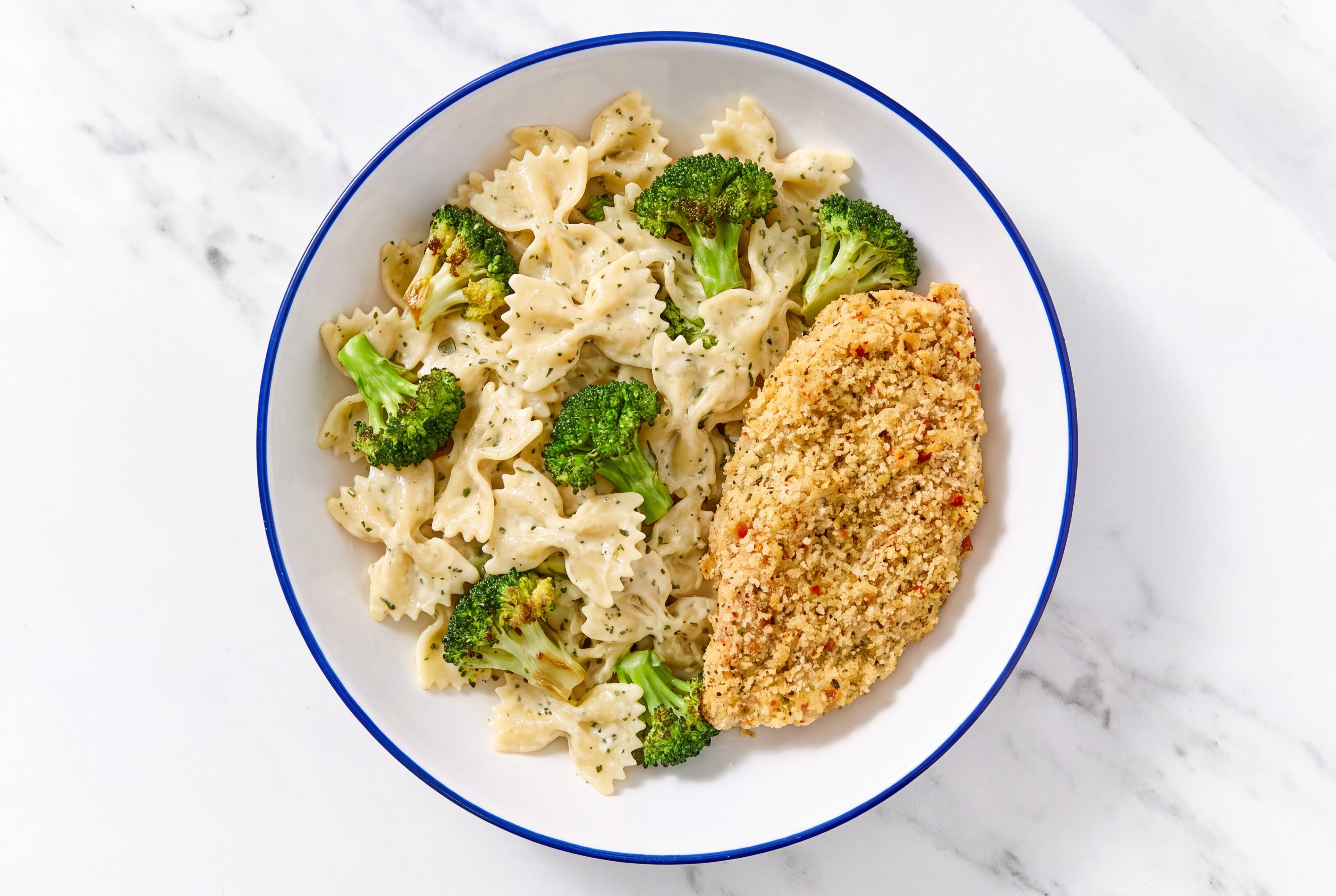 Crispy Garlic Chicken over Creamy Farfalle with Broccoli