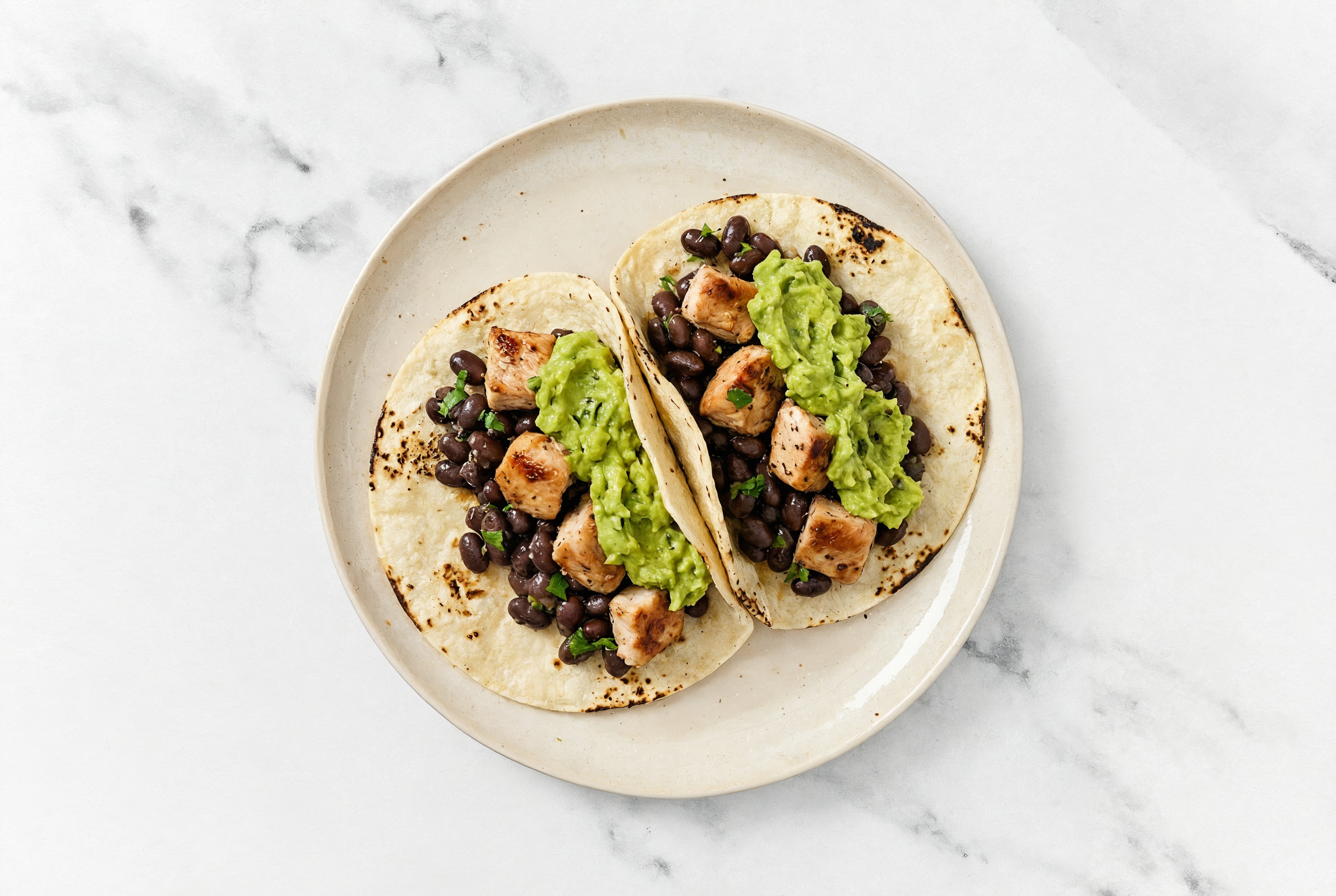 Hearty Garlic Turkey Tacos with Guacamole & Cuban Spiced Black Beans