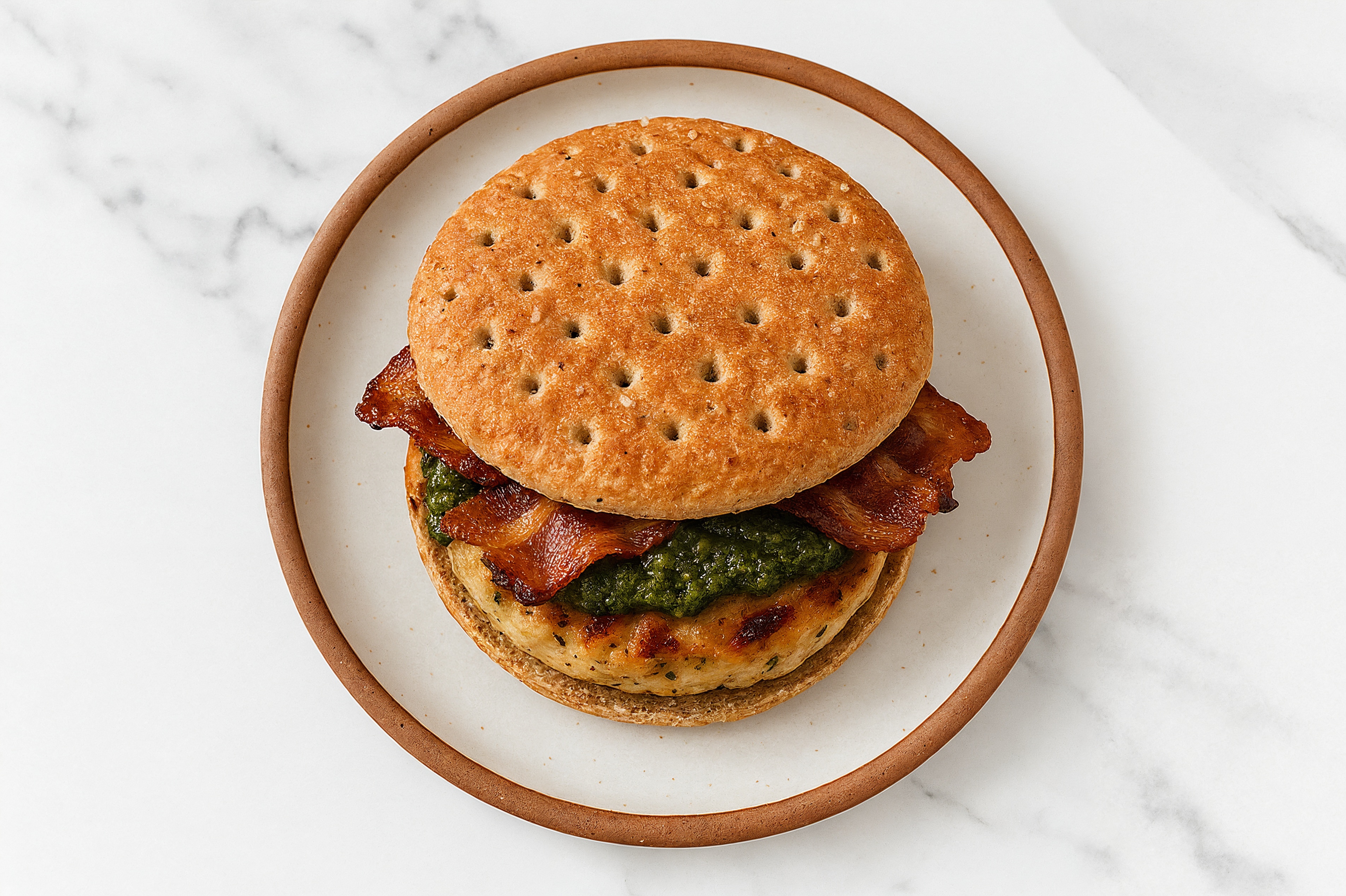 Garlic Chicken Burger on Multigrain with Spinach Pesto & Applewood Smoked Pork Bacon