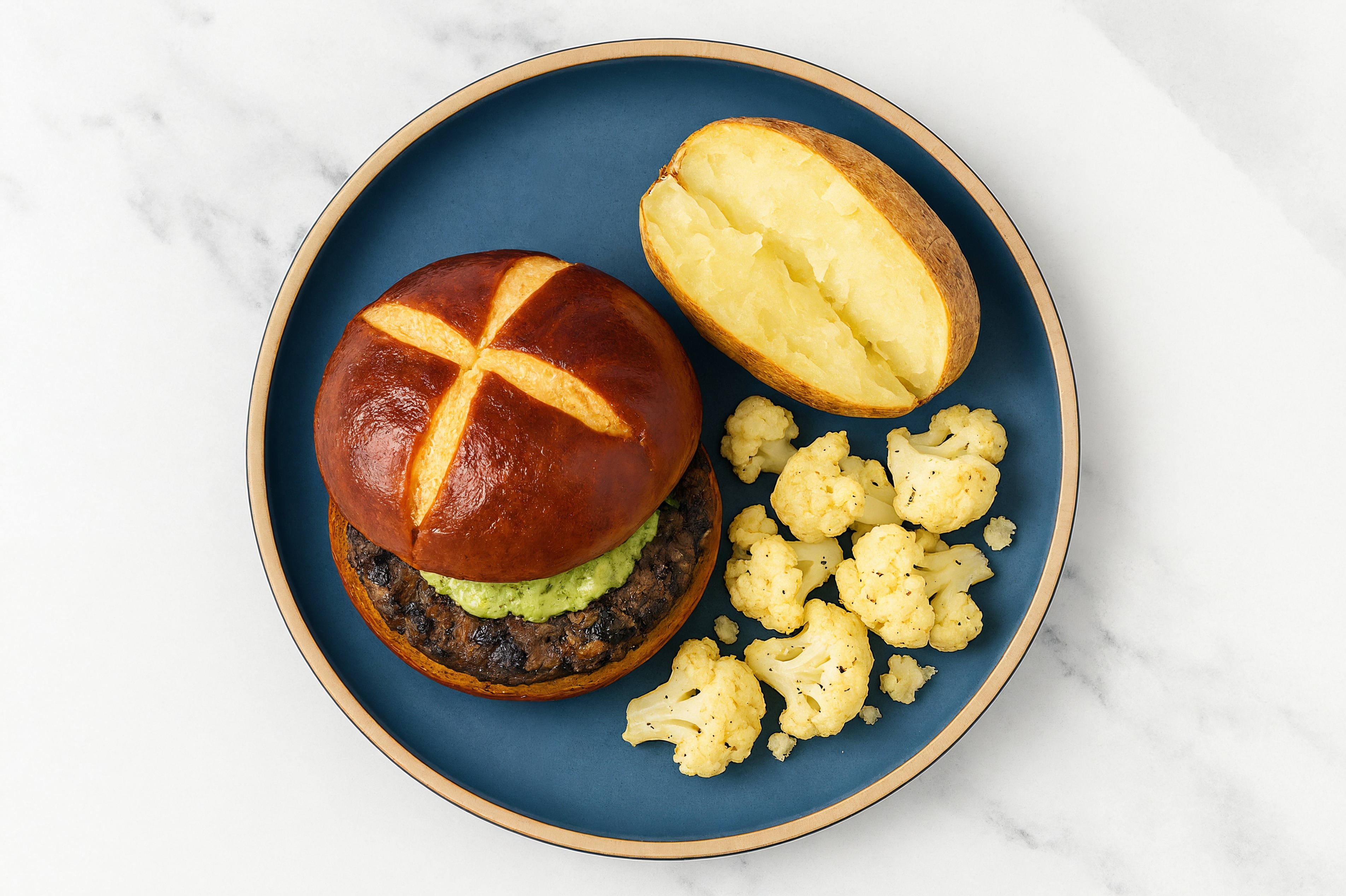 Pesto Black Bean Burger on Pretzel Bun with Cauliflower