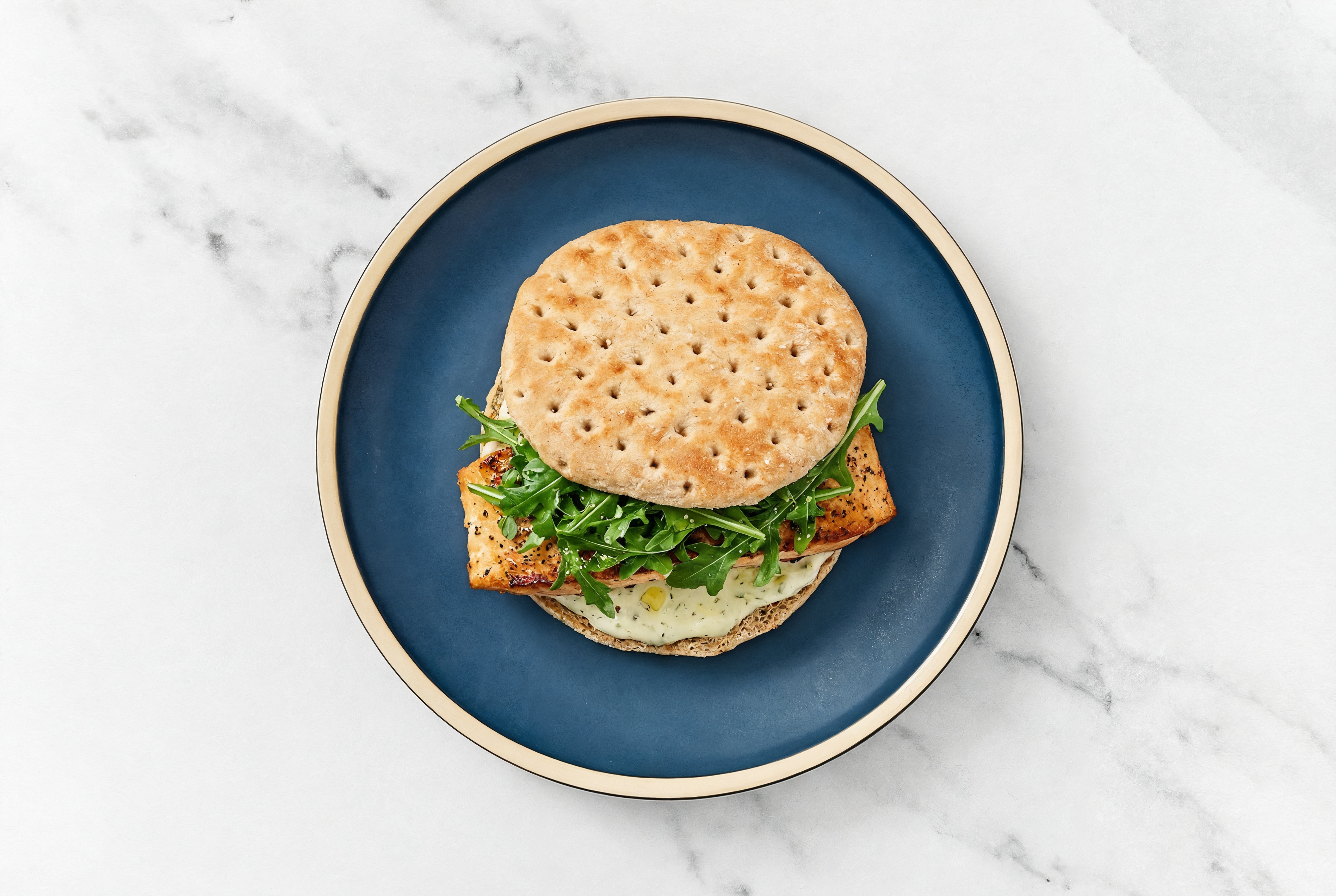 Dill Pickle Salmon Sandwich on Multigrain with Arugula