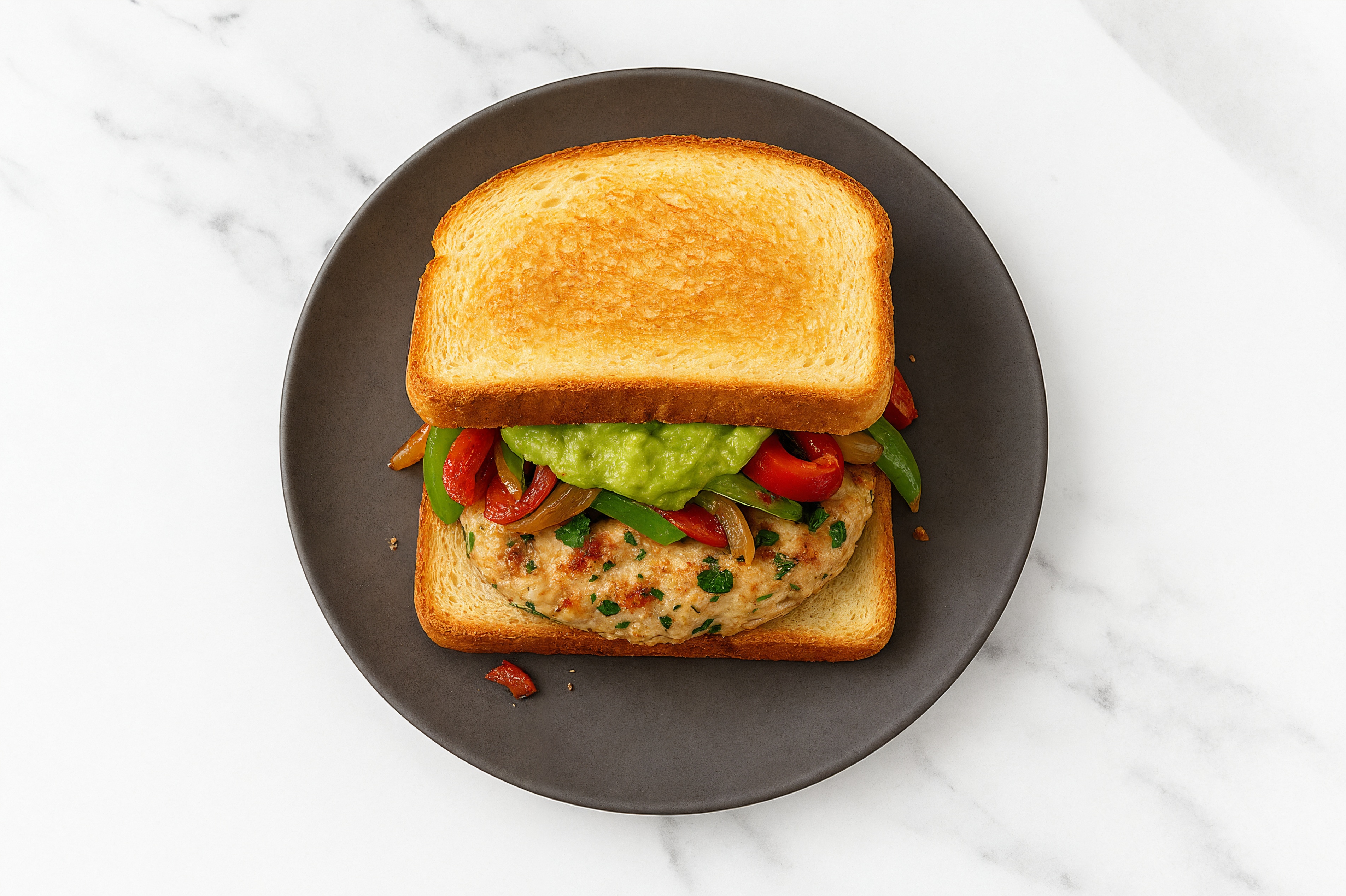 Onion + Pepper Chicken Burger on GF Bread with Guacamole
