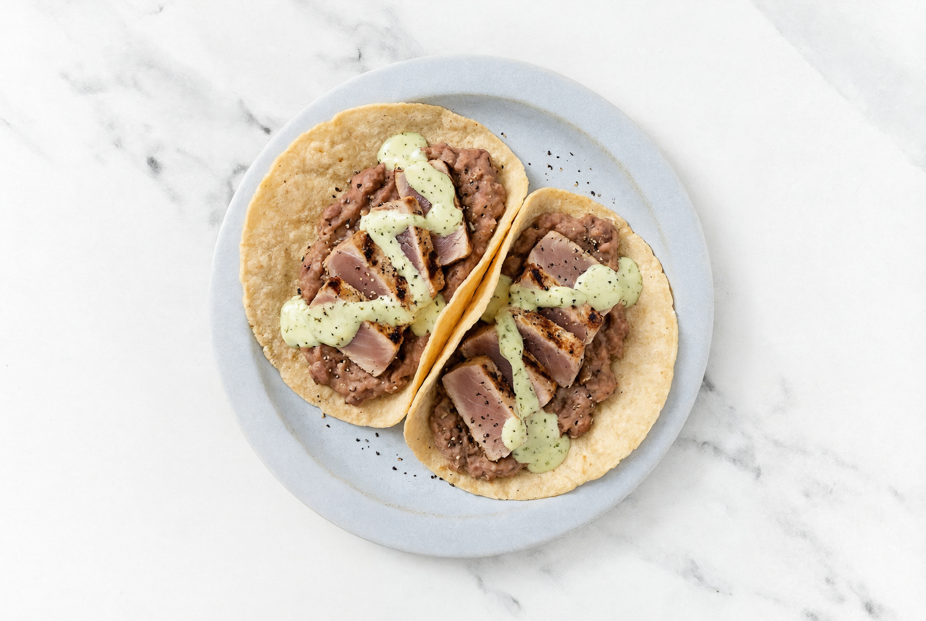Refried Red Bean Tacos with Seared Tuna & Jalapeño Crema