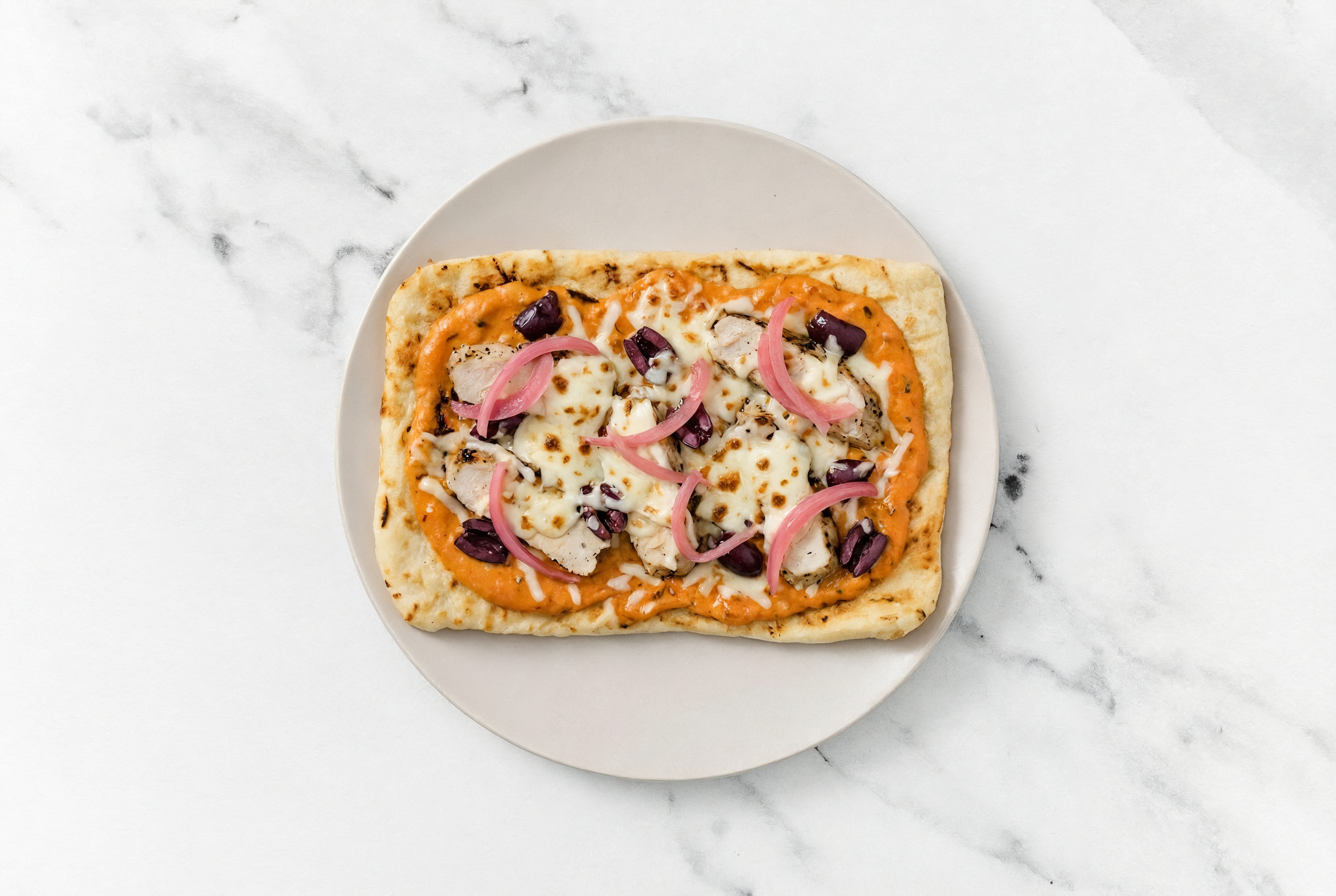 Creamy Pork + Olives Pizza with Pickled Onion