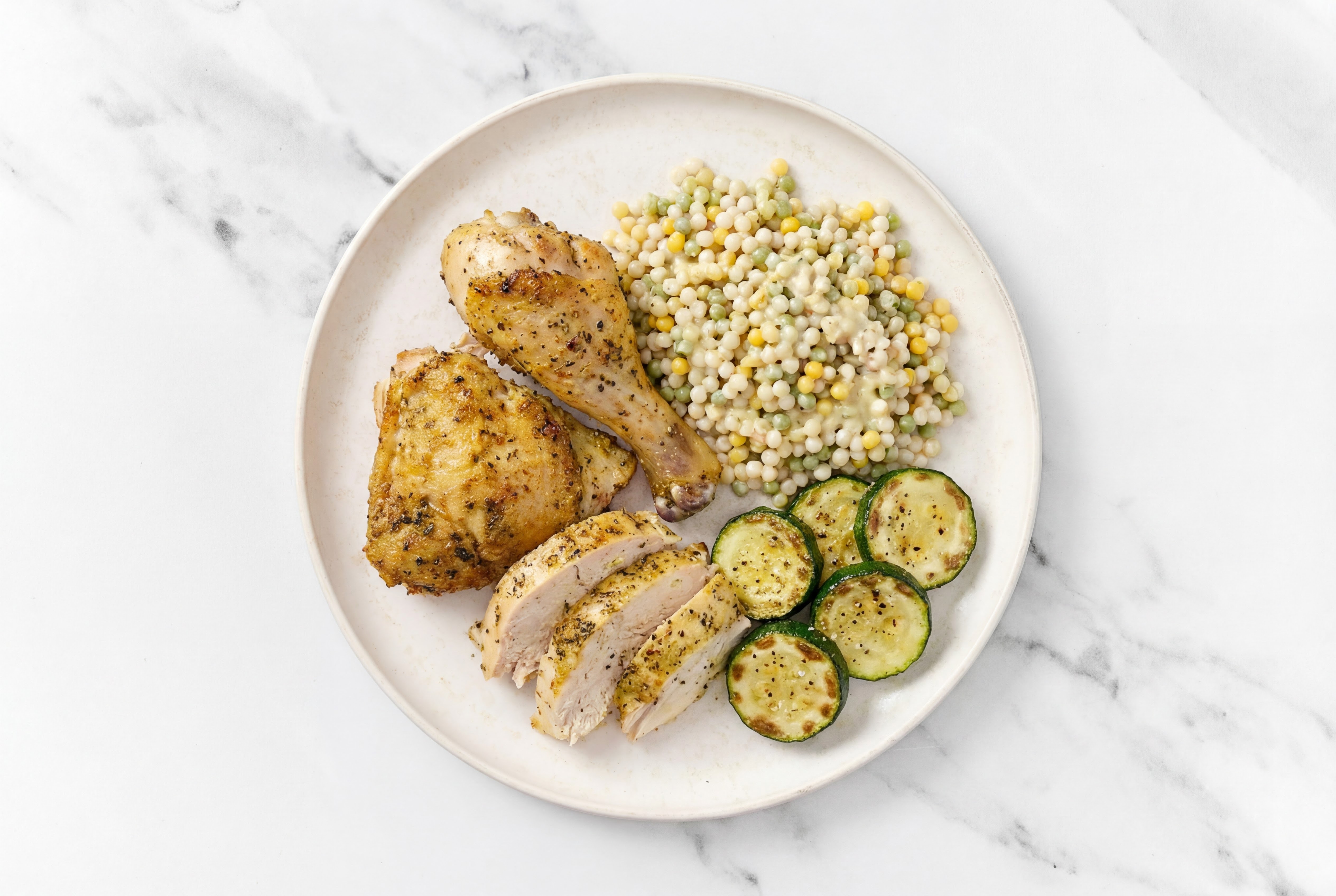 Herby Juicy Chicken + Zucchini with  Couscous