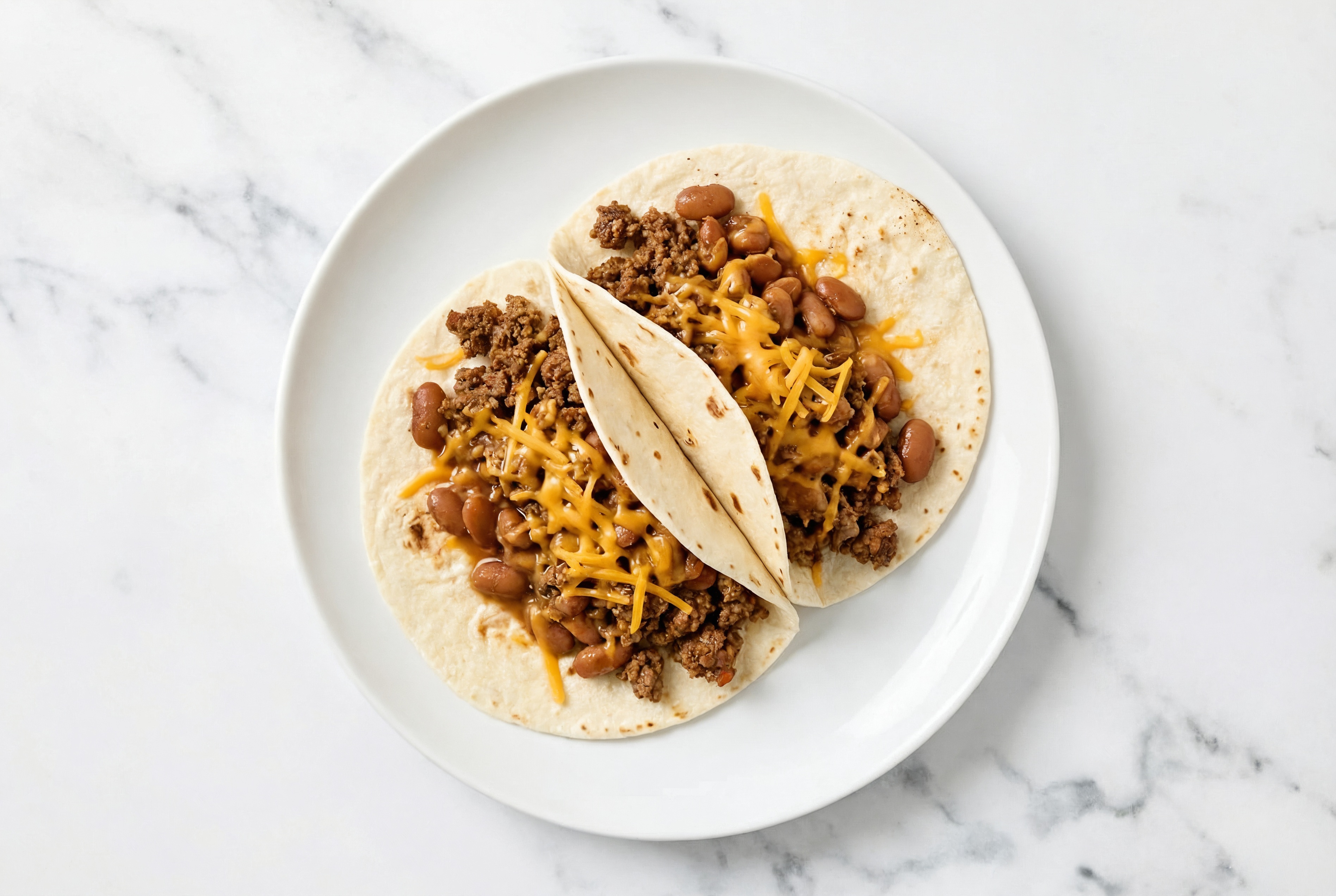 Mexican-Style Ground Beef Tacos with Cheddar Cheese & Pinto Beans