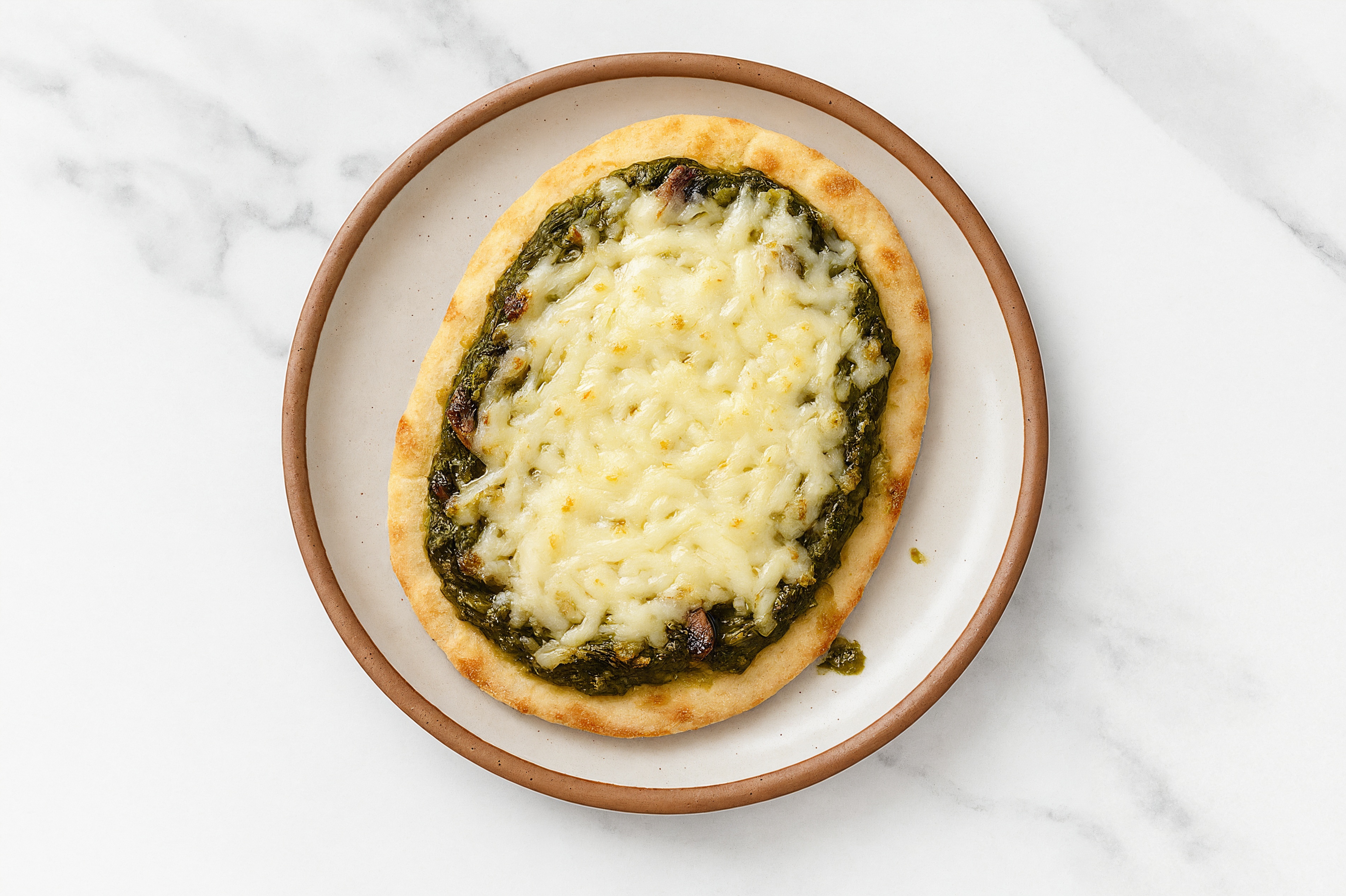 Cheezy Saag Mushroom Naan