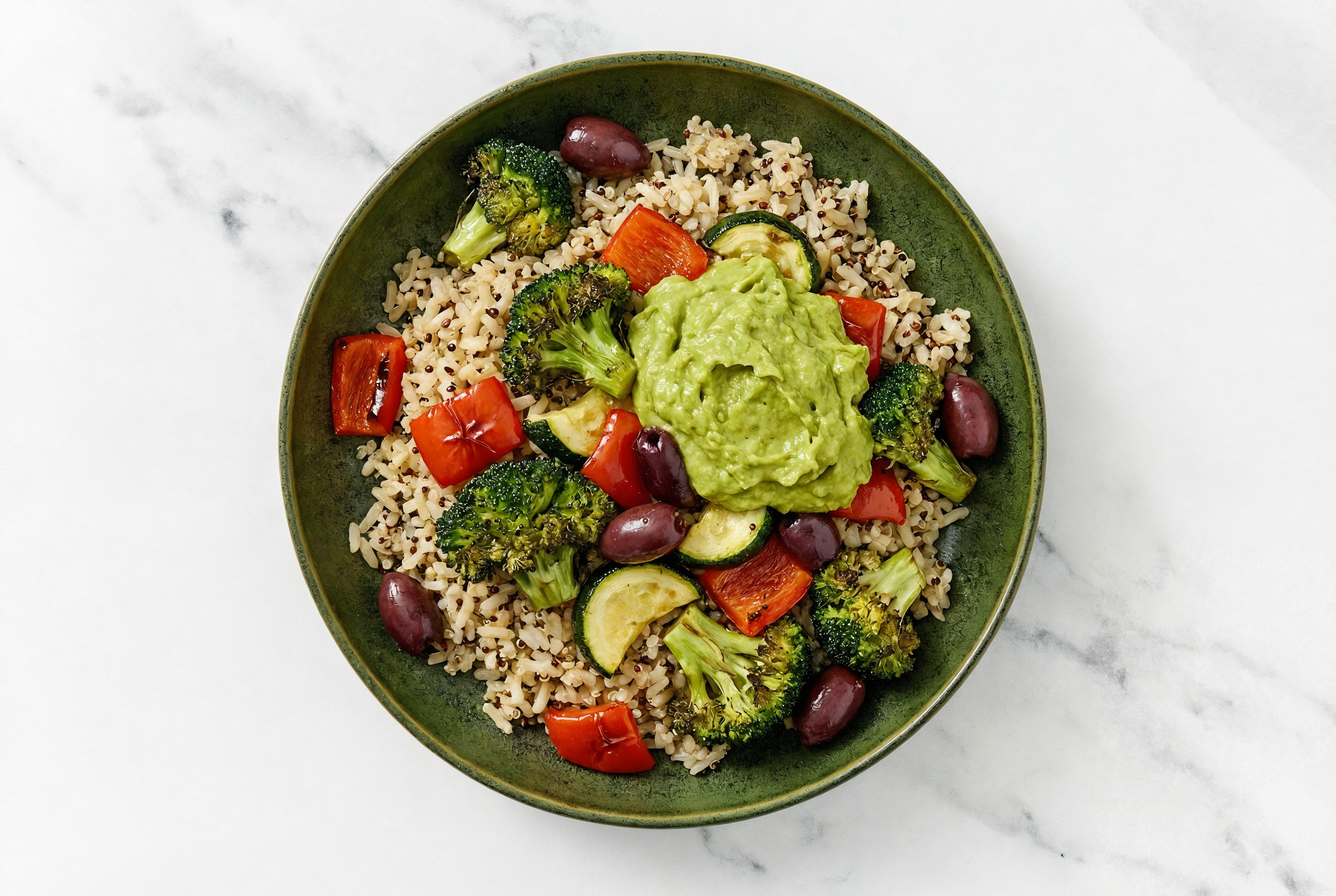 Hearty Roasted Veggie + Guacamole Rice Bowl with Broccoli Florets
