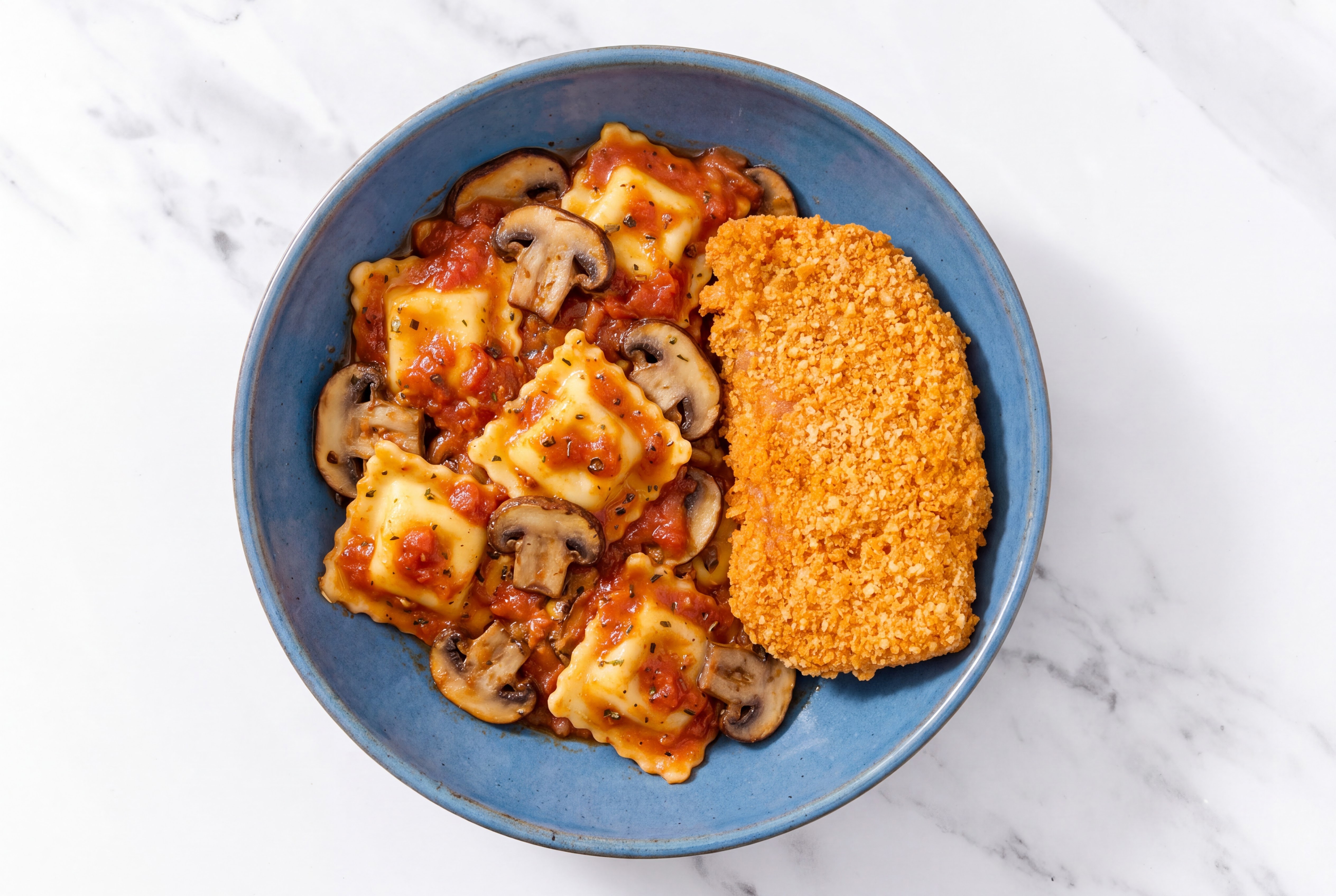 Crispy Hot Honey Chicken over Marinara Ravioli with Baby Bella Mushrooms