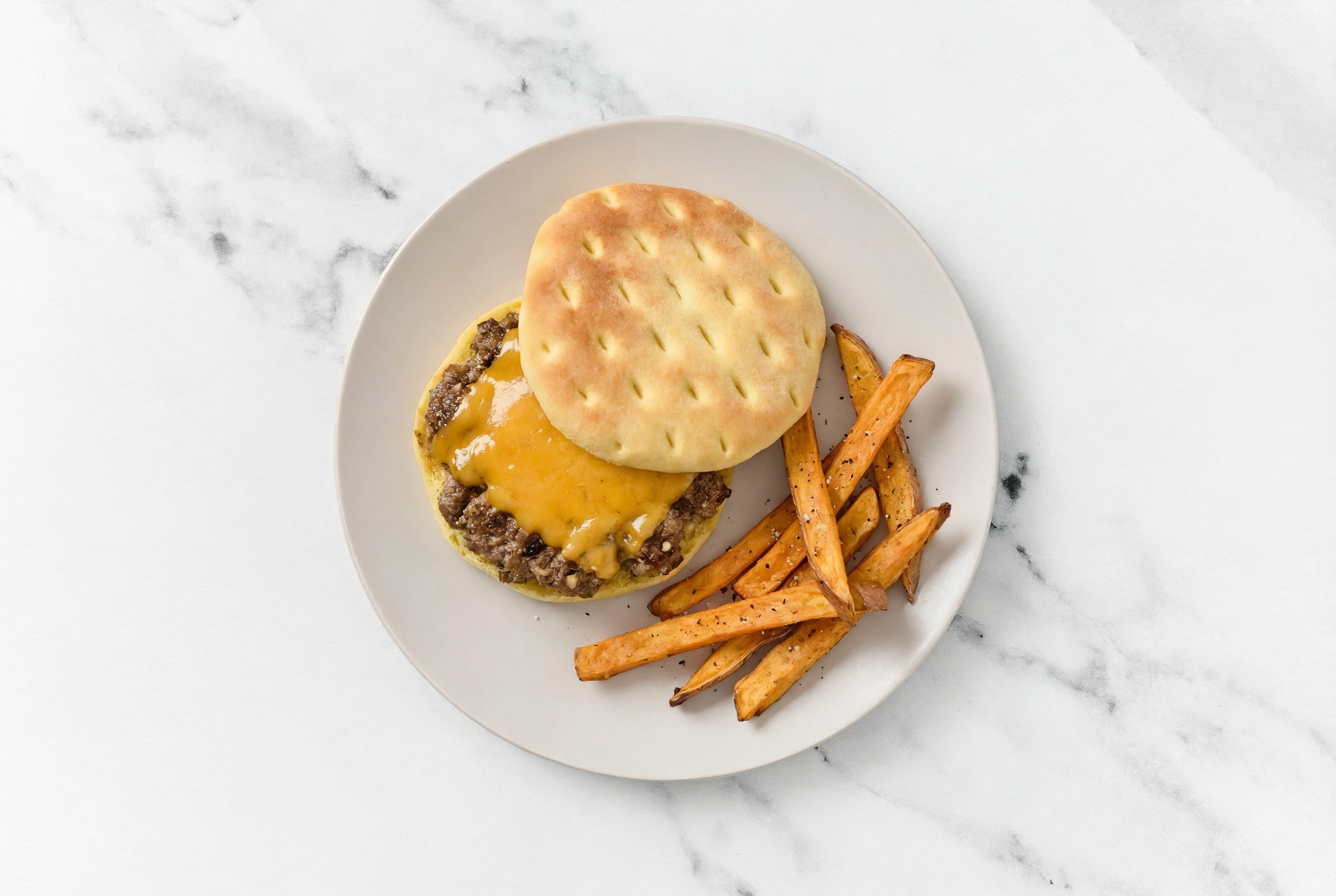 Herby Cheesy Italian-Style Ground Beef Burger + Sweet Potato Fries