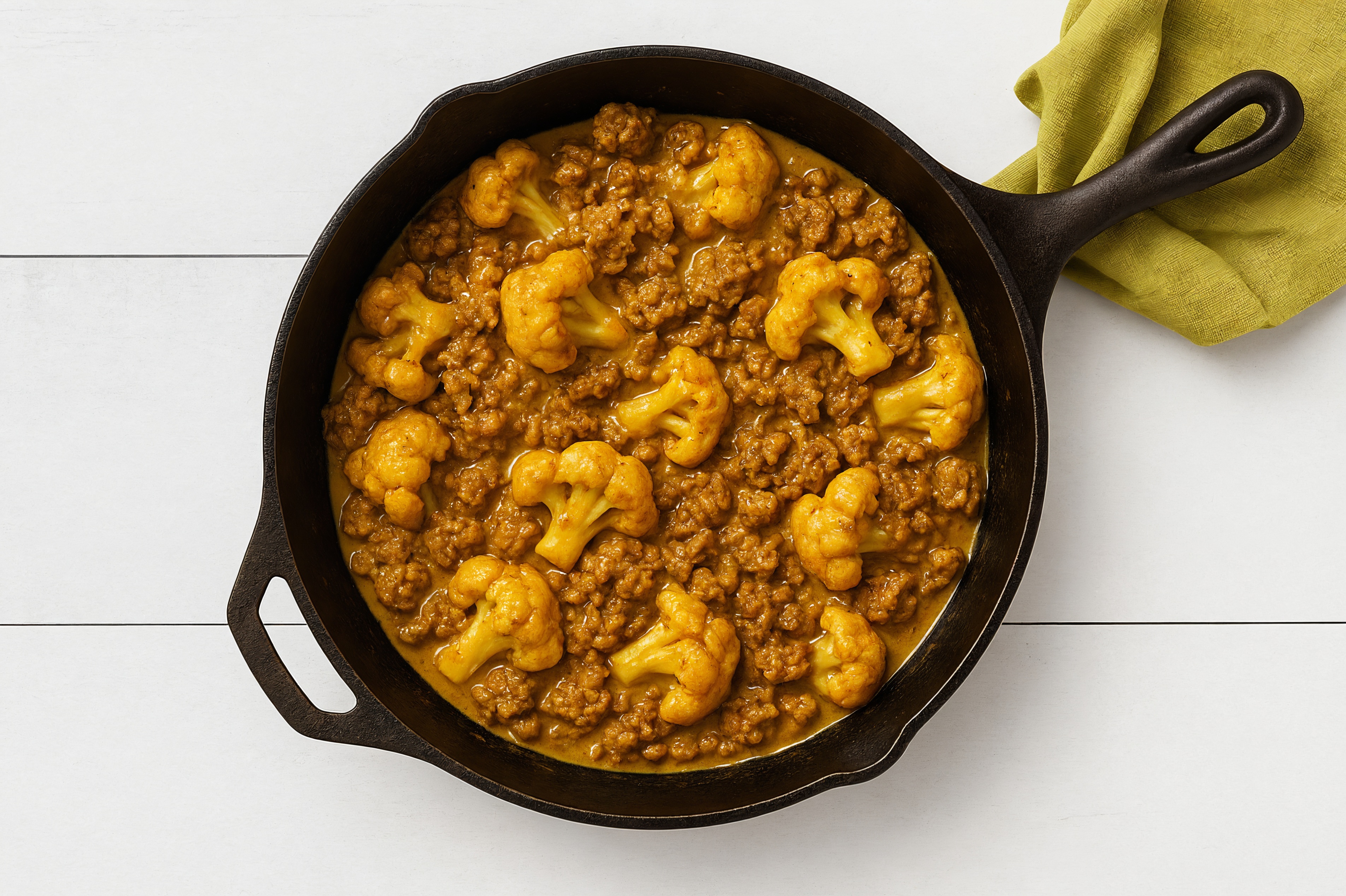 Coconut Curry Ground Beef Stir-Fry with Cauliflower Florets over Brown Rice