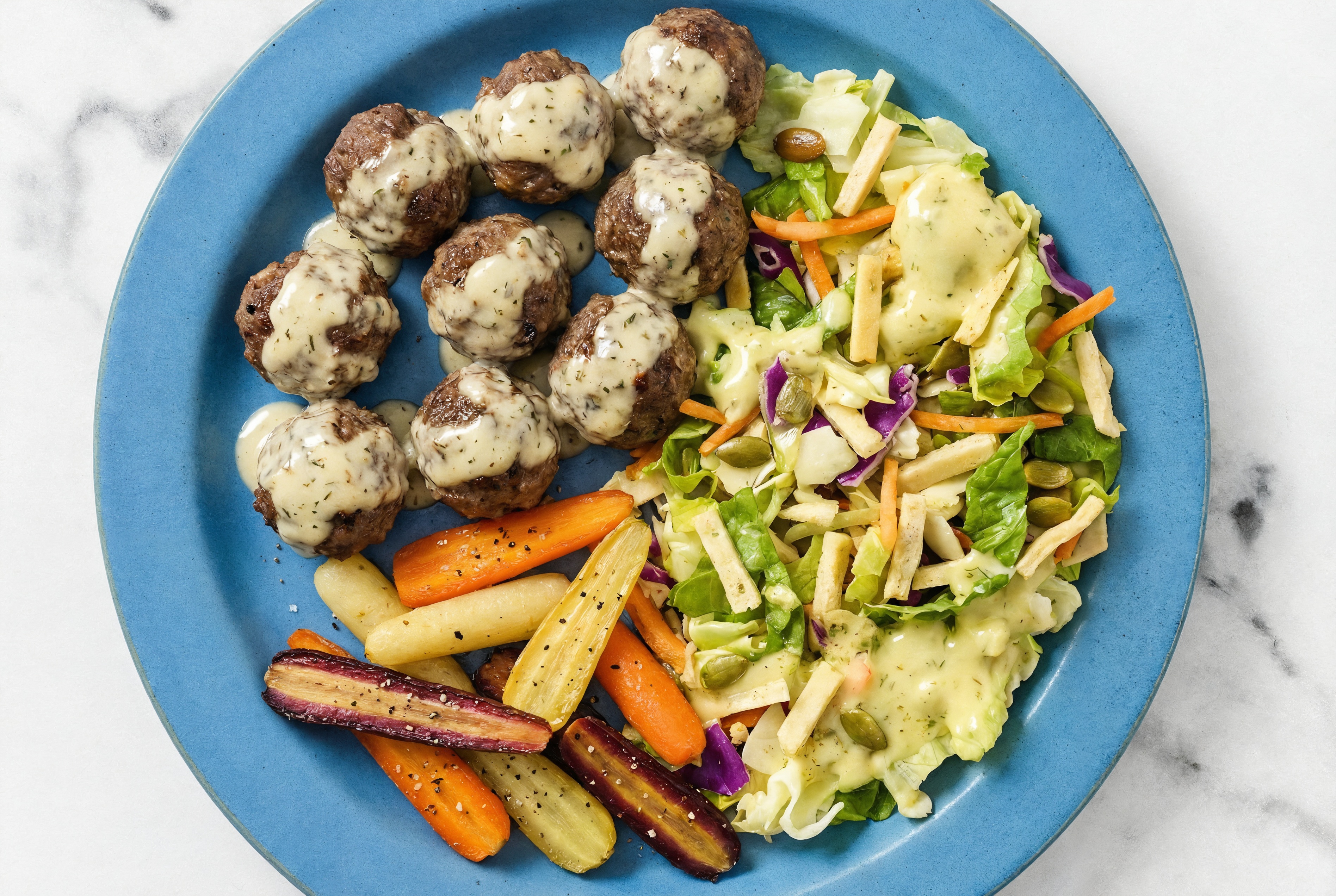 Creamy Garlic Baked Bison Meatballs & Baby Carrots with Avocado Salad