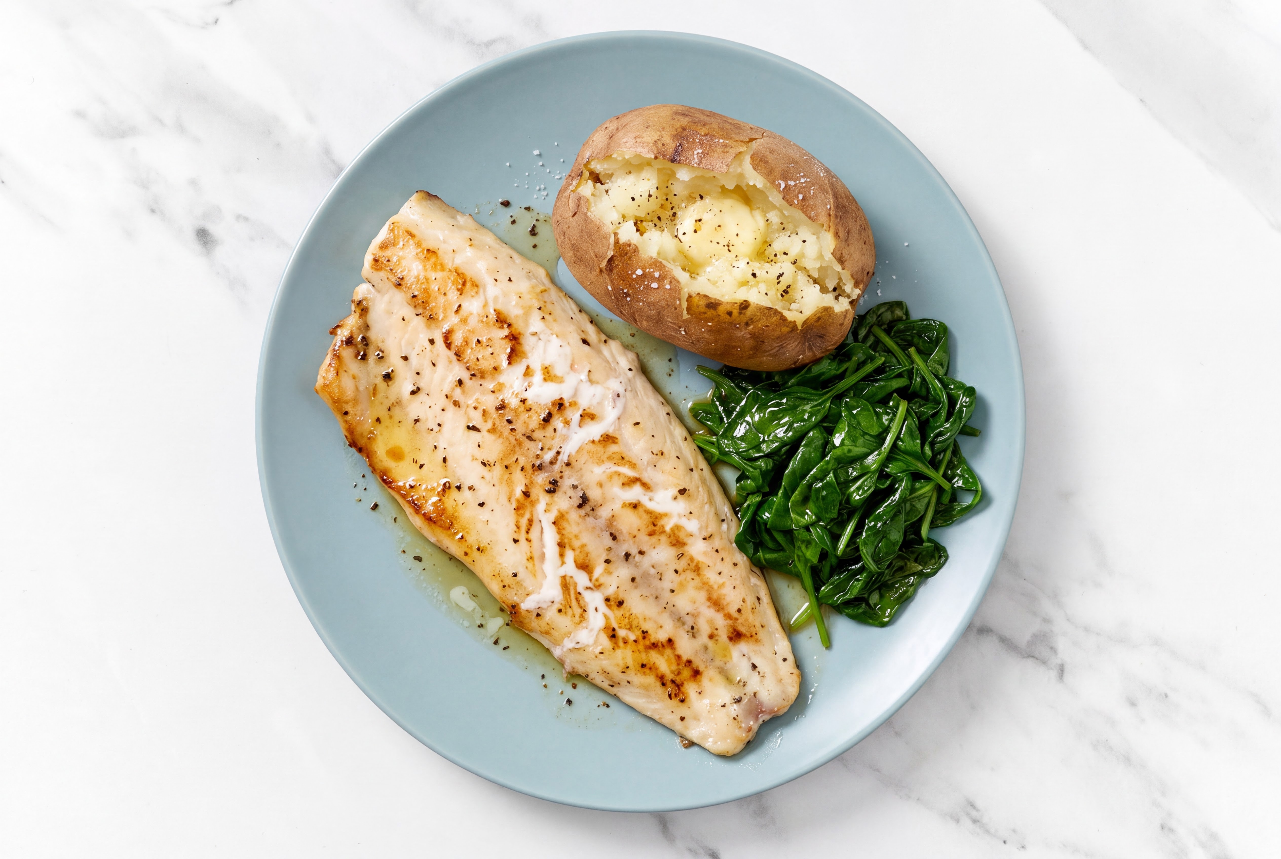 Roasted Honey Herb Steelhead Trout with Sautéed Baby Spinach
