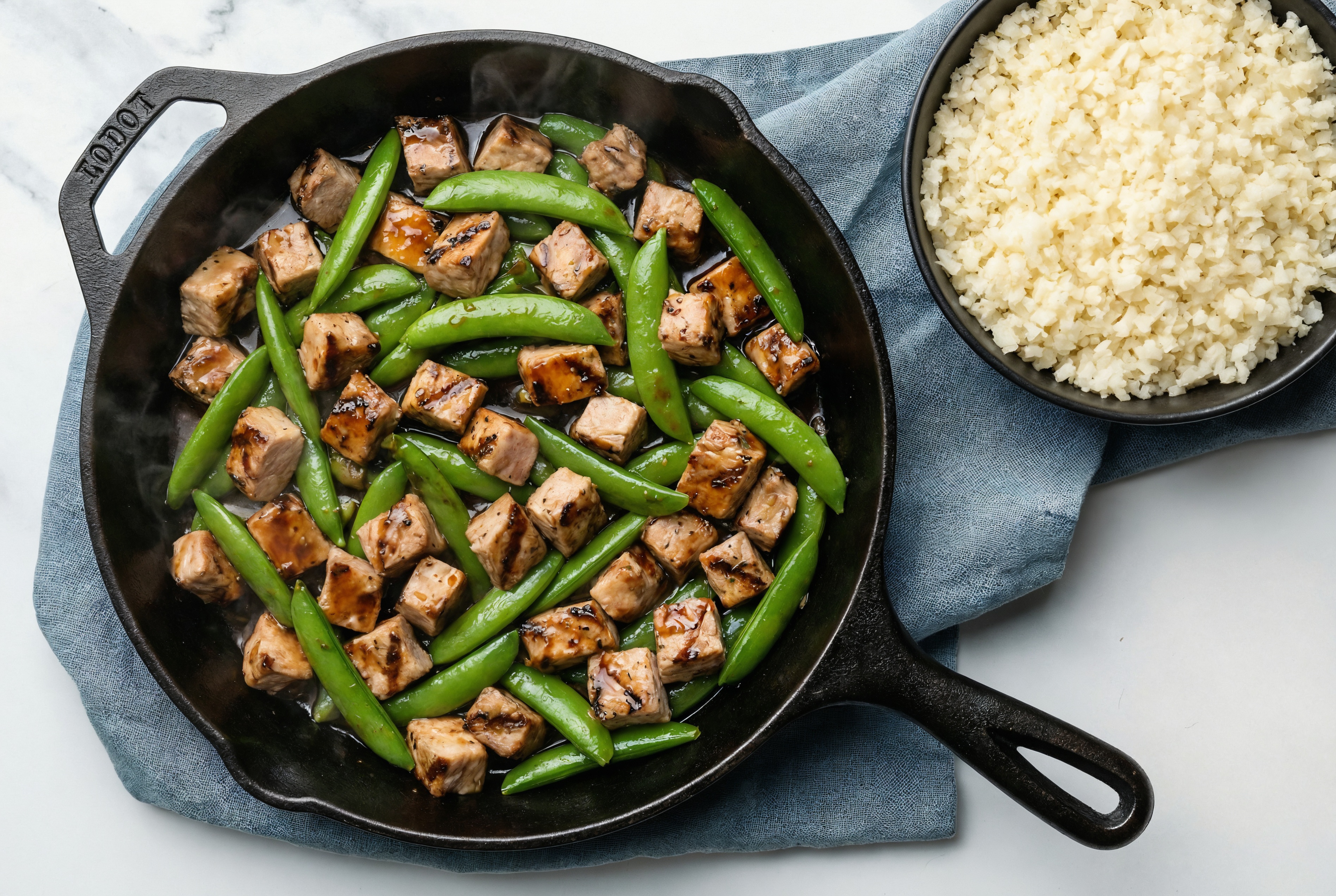 Japanese BBQ Grilled Pork Stir-Fry with Snap Peas over Riced Cauliflower