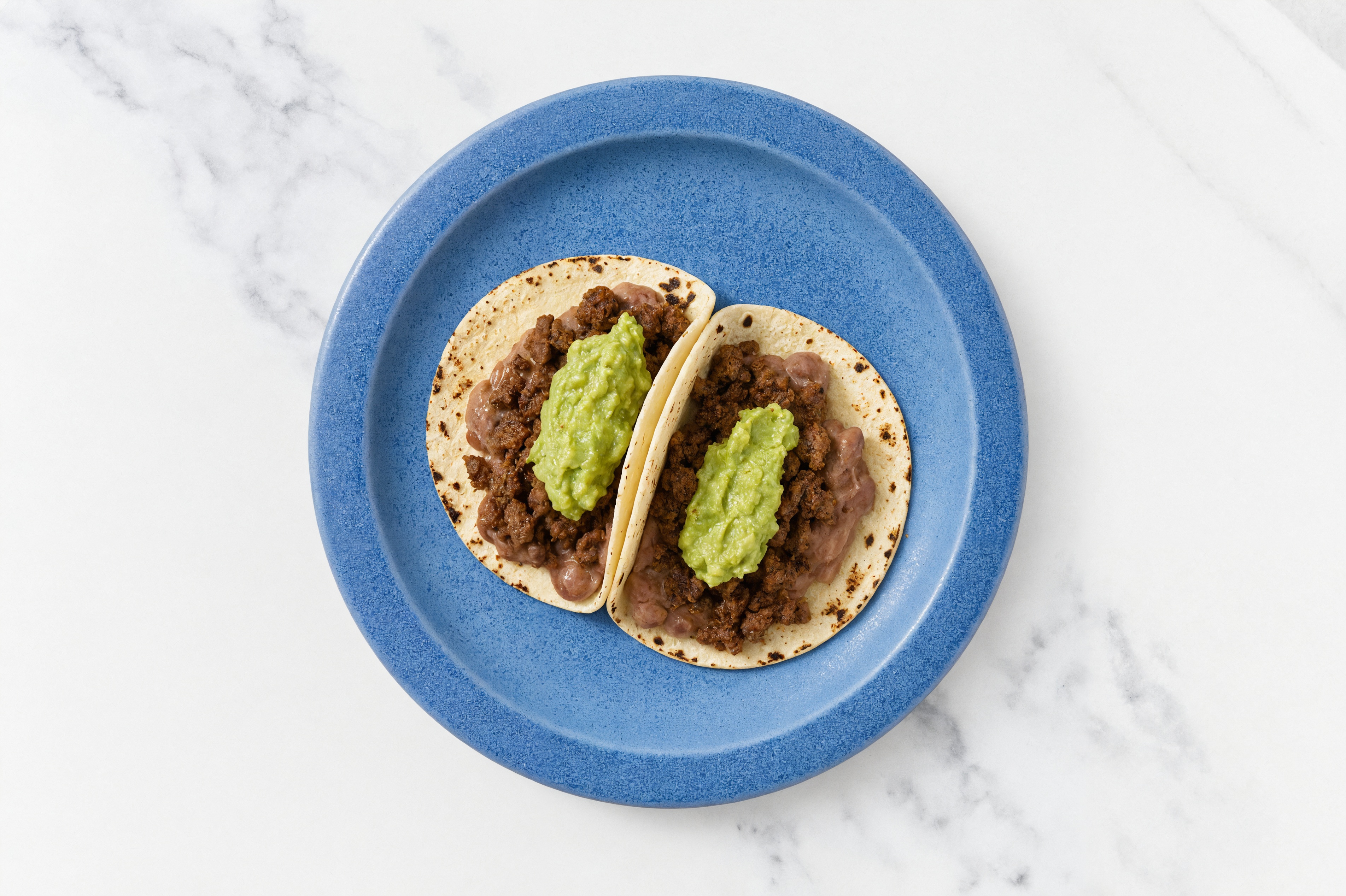 Hearty Ground 93/7 Lean Beef Tacos with Guacamole & Refried Red Beans