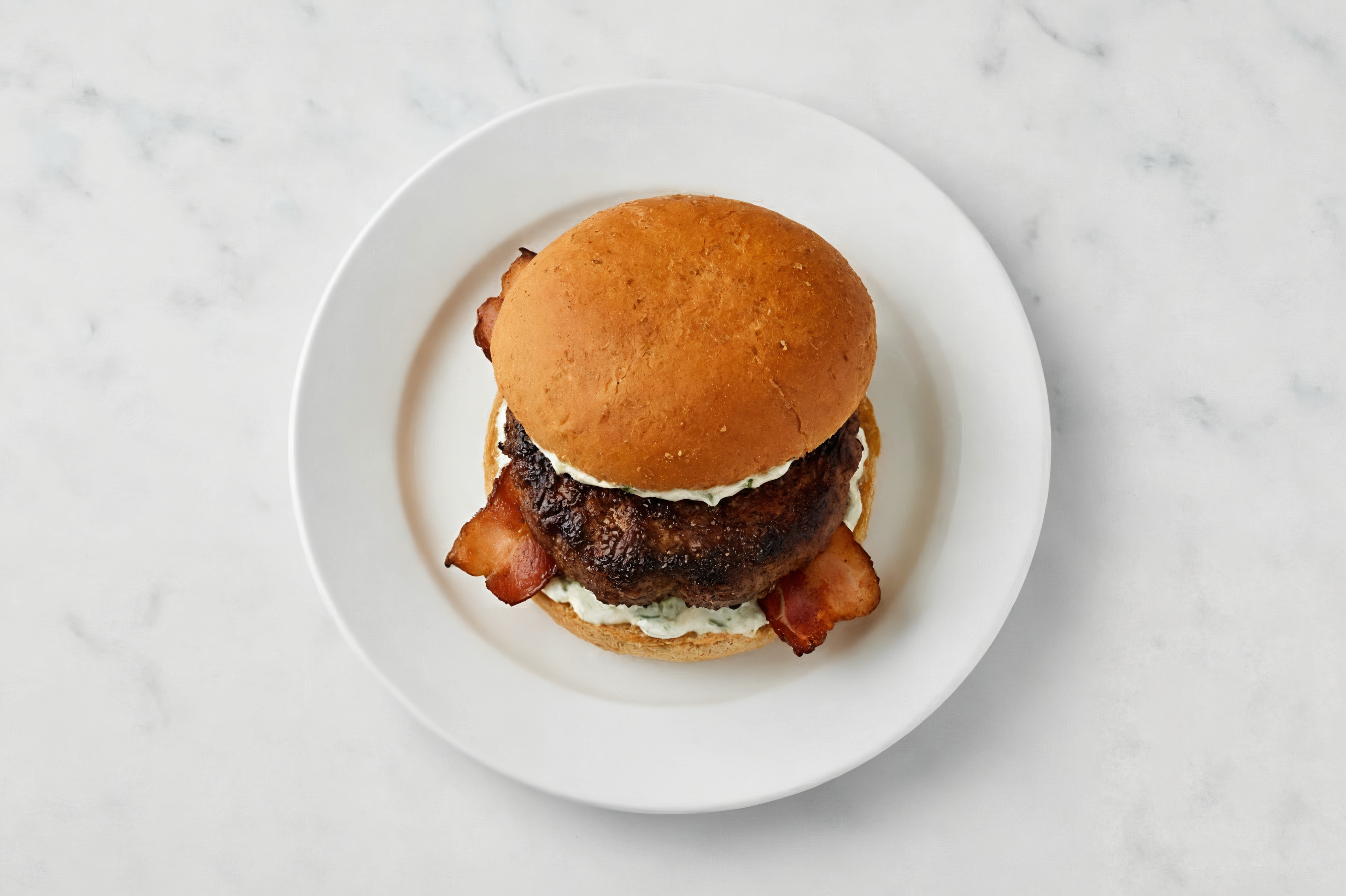 Bison Burger on Sprouted Grain with Tzatziki & Turkey Bacon