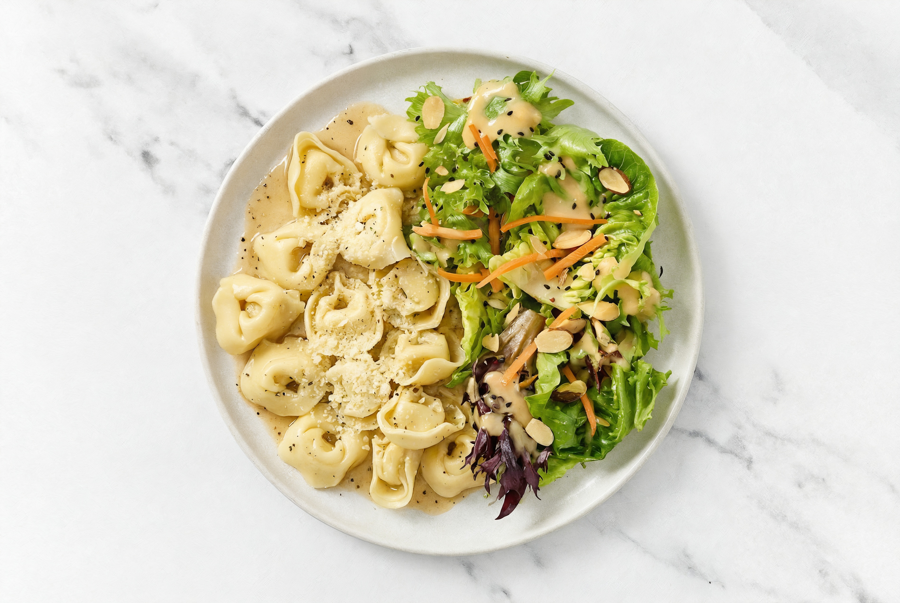 Herby Tortelloni with Brown Melt Organic Cold-Pressed Plant Butter Sauce