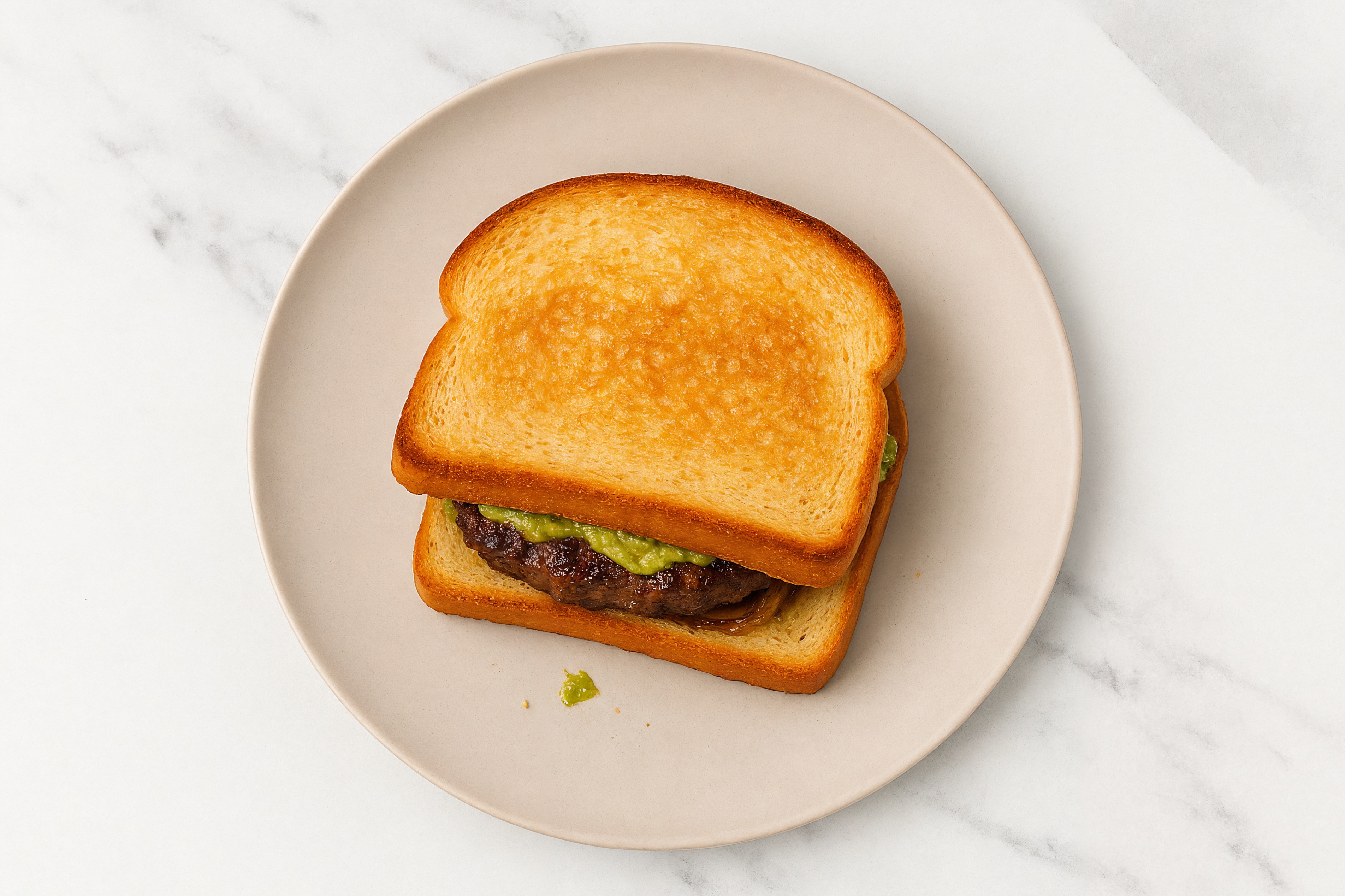 Caramelized Onion Tavern Beef Burger on GF Bread with Guacamole