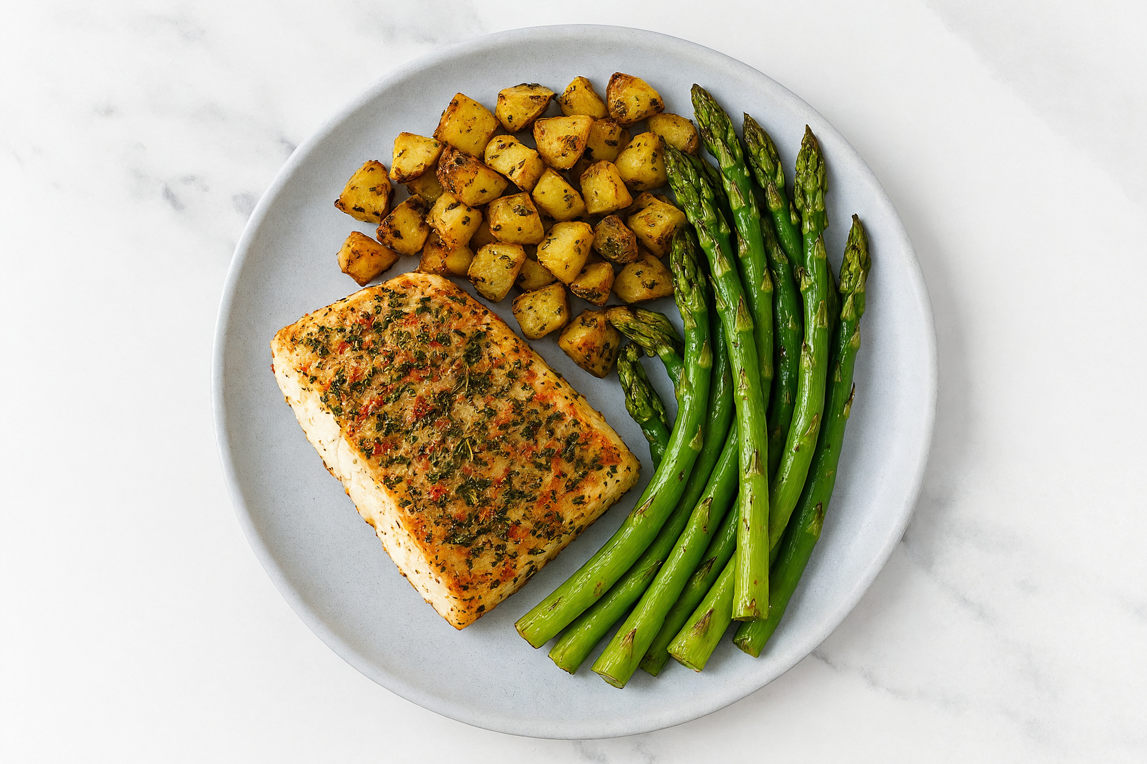 Roasted Garlic Halibut with Herbed Potatoes + Asparagus