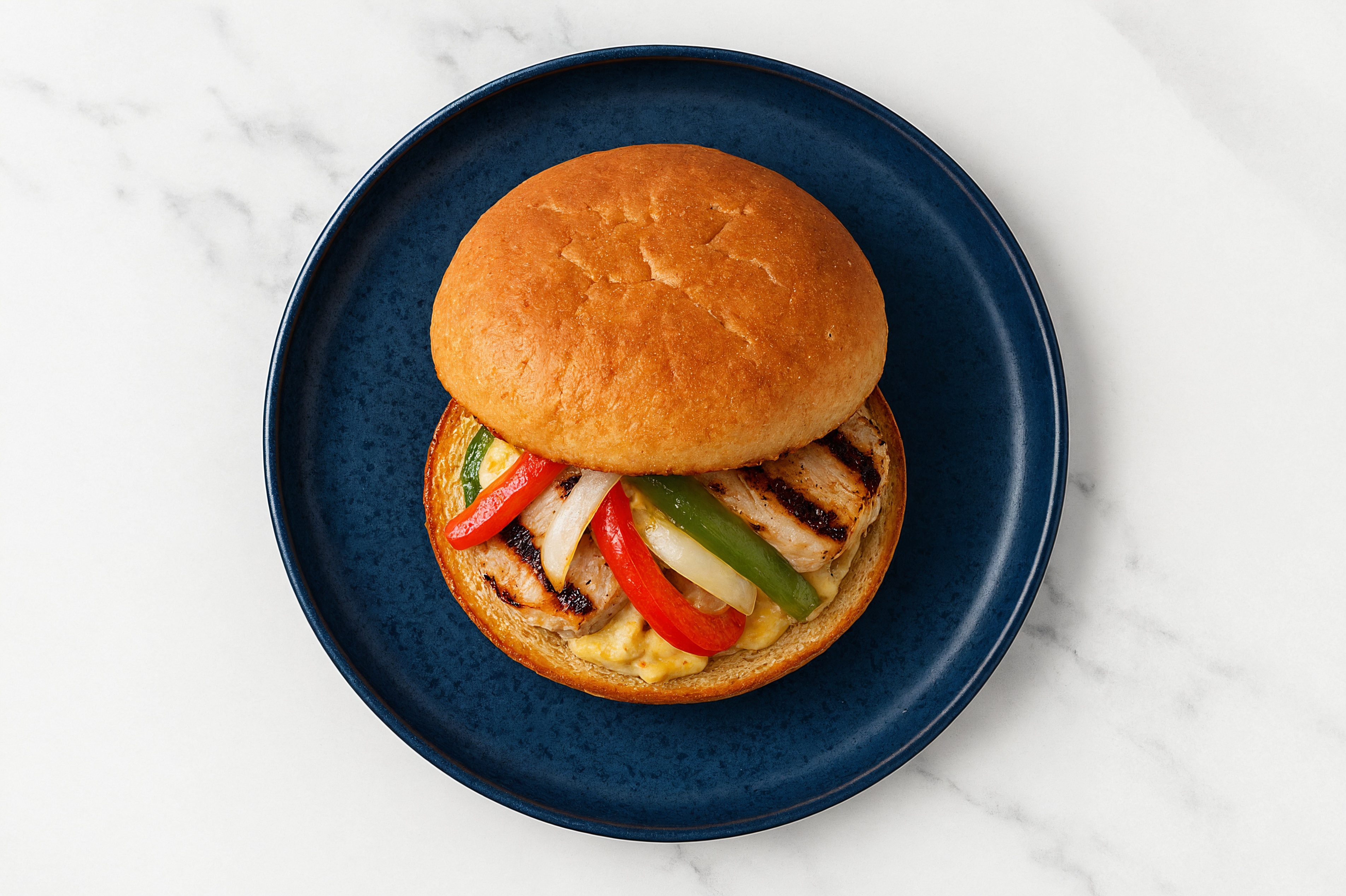 Street Corn Grilled Pork Sandwich with Peppers + Onion on Gluten-Free Buns