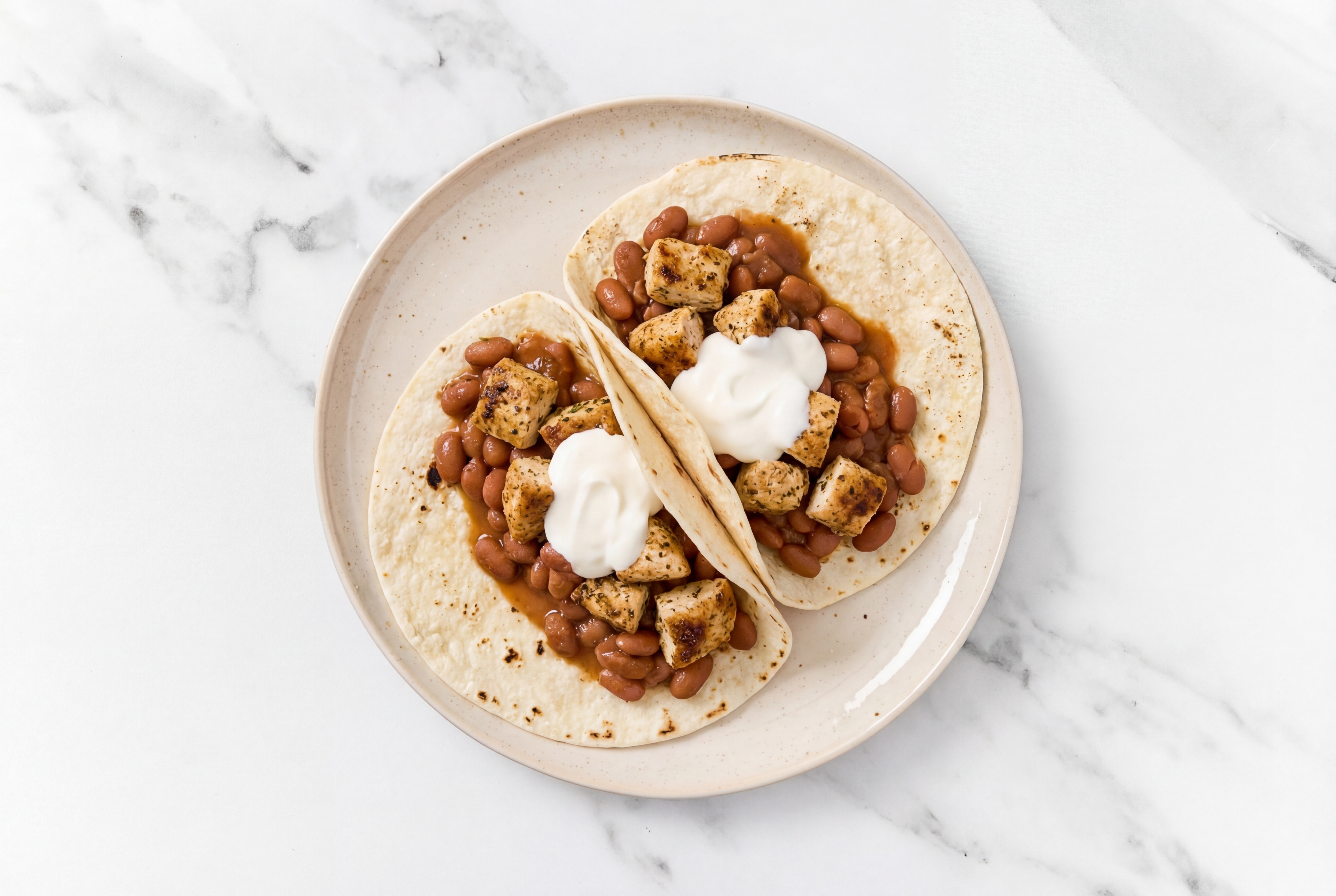 Garlic Chicken Tacos with Crema & Pinto Beans