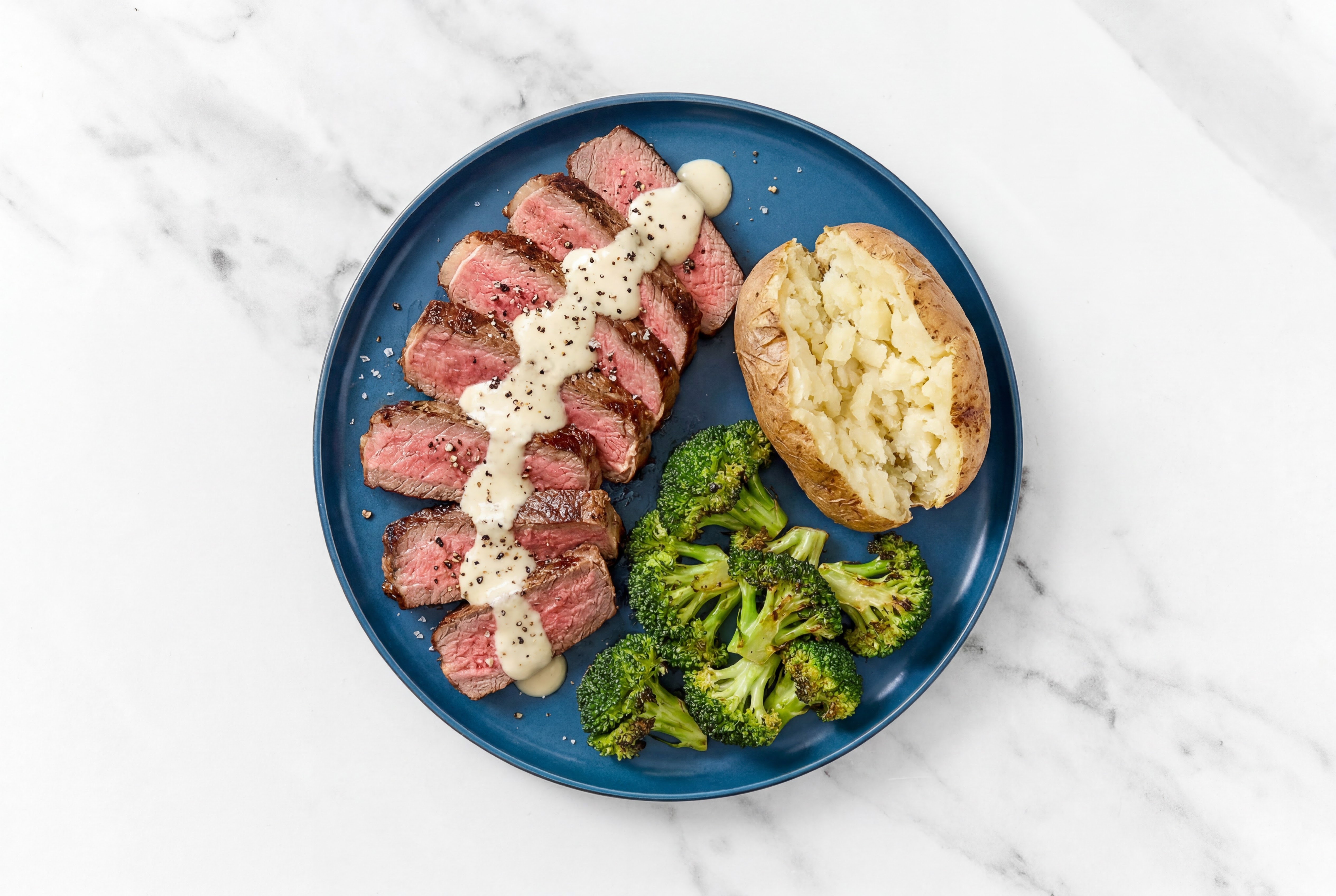 New York Strip with Garlic Sauce + Broccoli