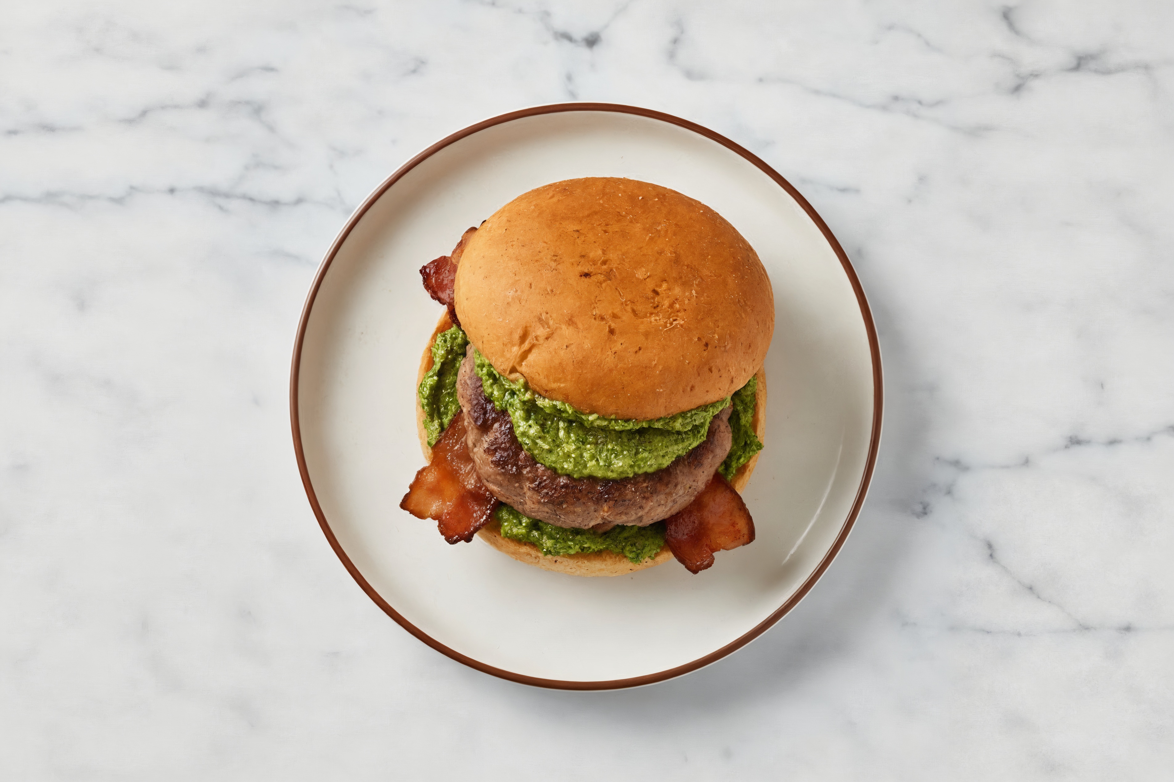 Lamb Burger on Sprouted Grain with Spinach Pesto & Turkey Bacon