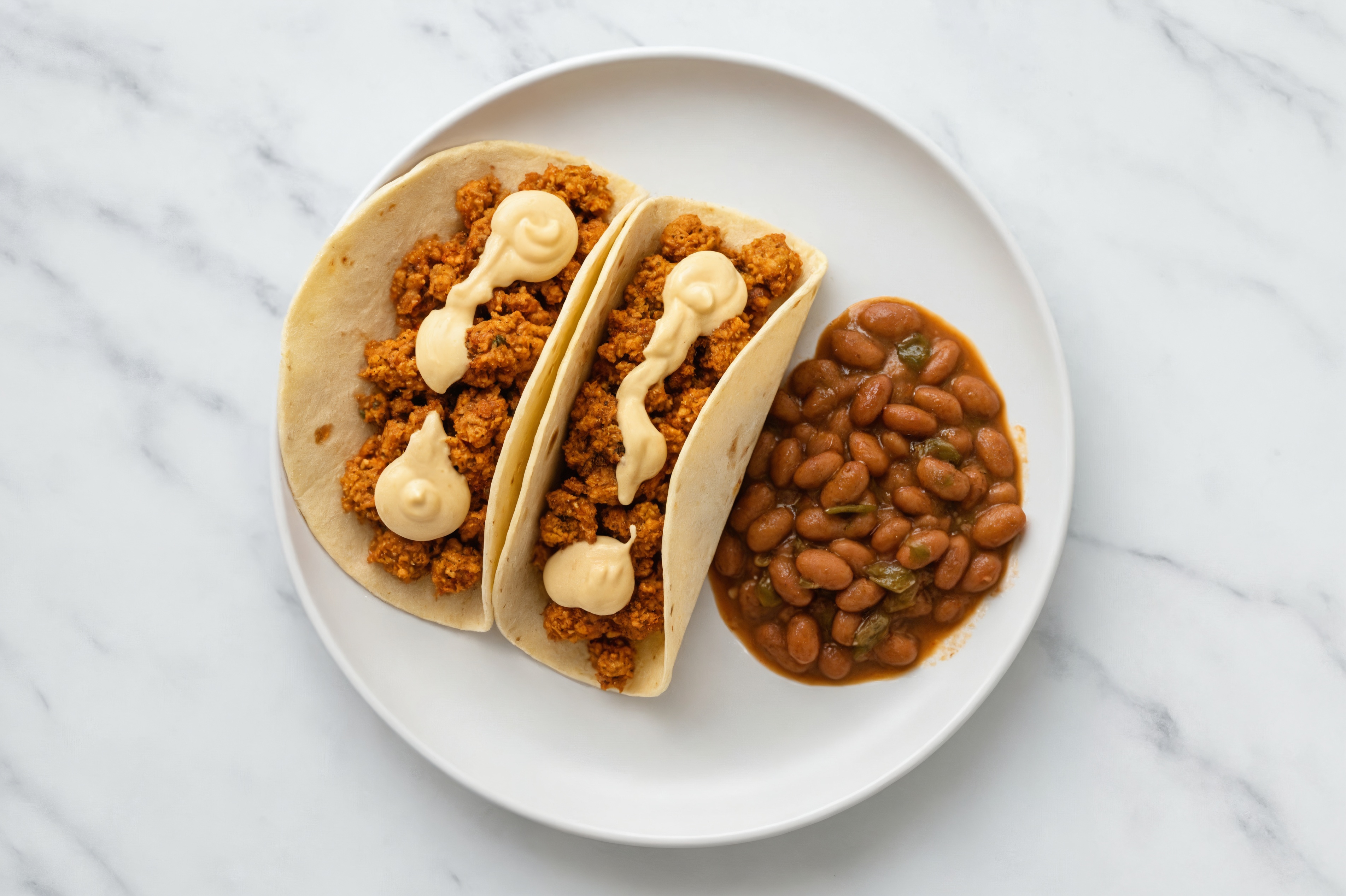 Plant-Based Taco Grounds + Cashew Queso Low Carb Tacos with Pinto Beans