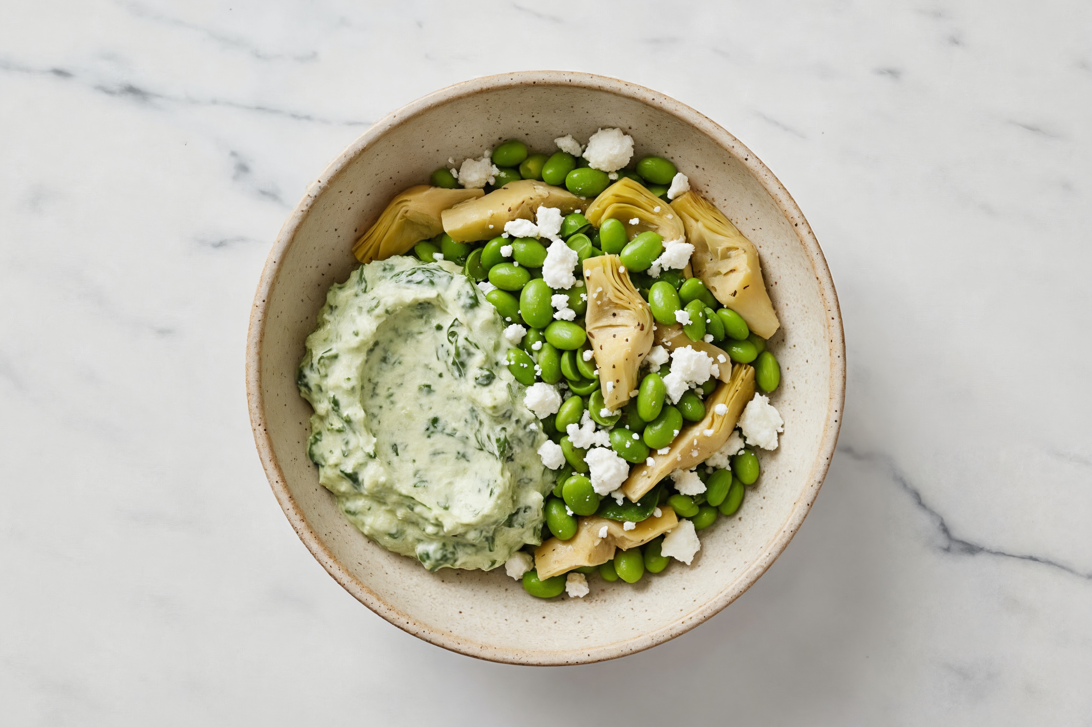 Feta Artichoke Edamame Bowl over Spinach Artichoke Dip