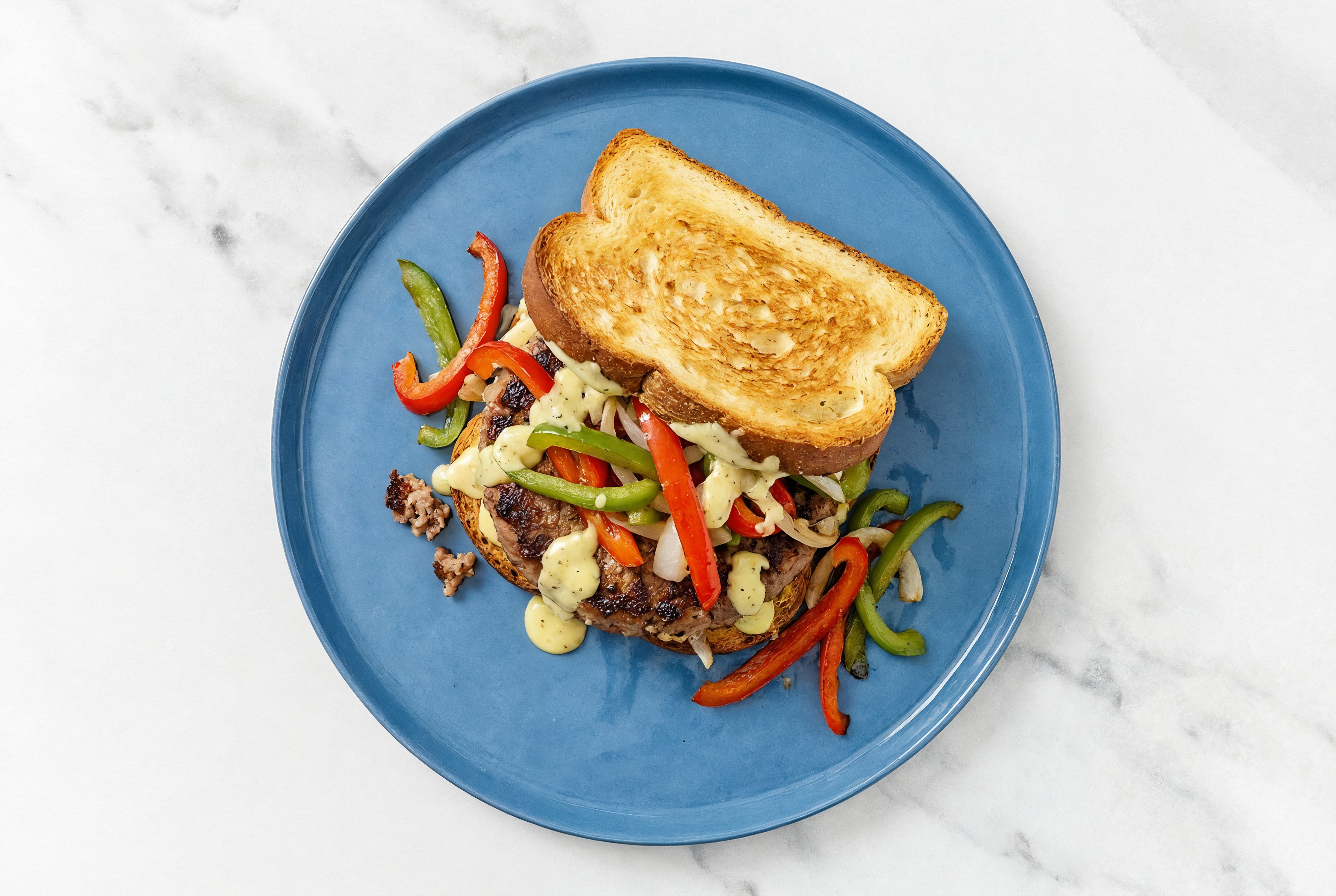Onion + Pepper Beyond Burger on GF Bread with Honey Mustard