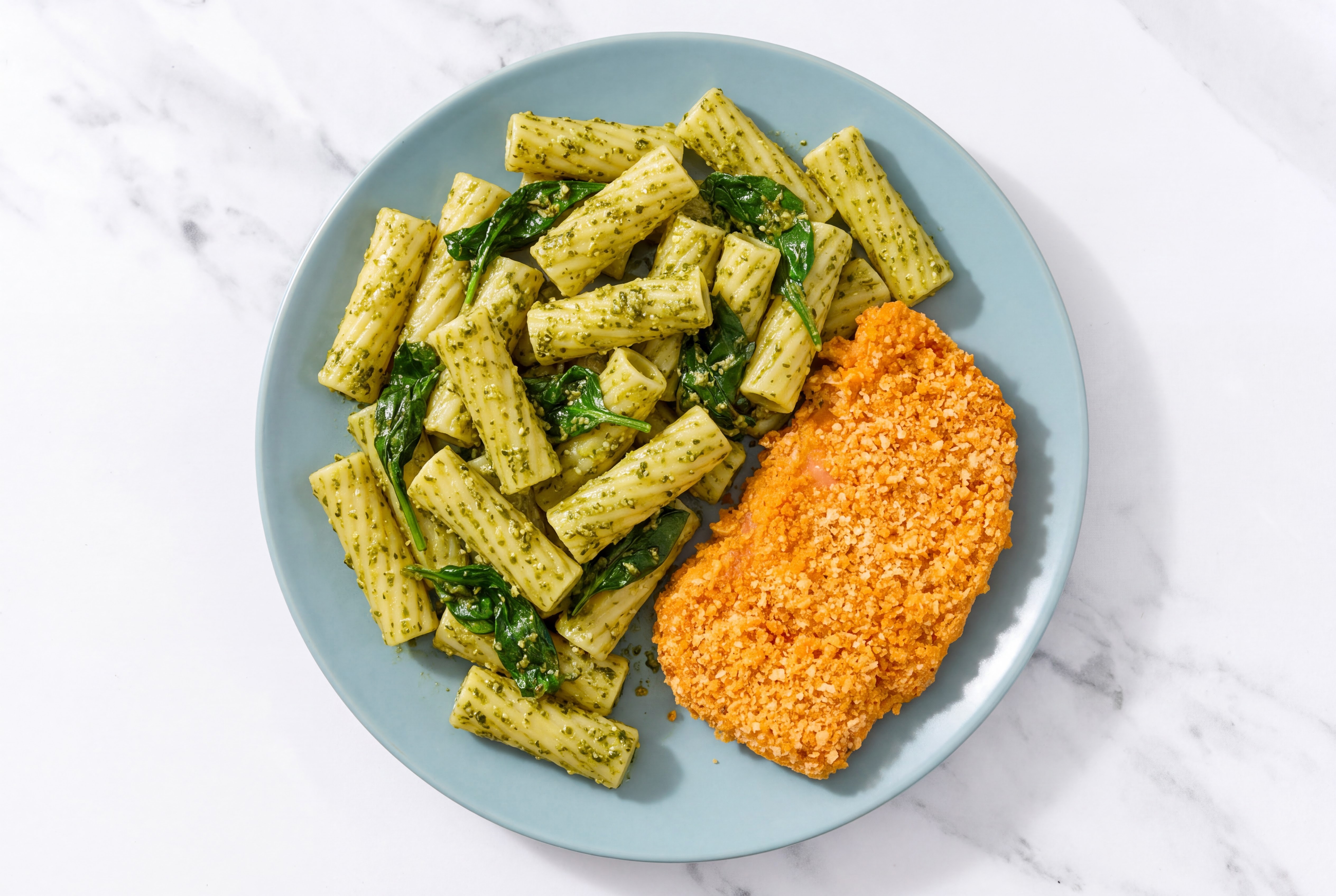 Crispy Hot Honey Chicken over Pesto Rigatoni with Baby Spinach