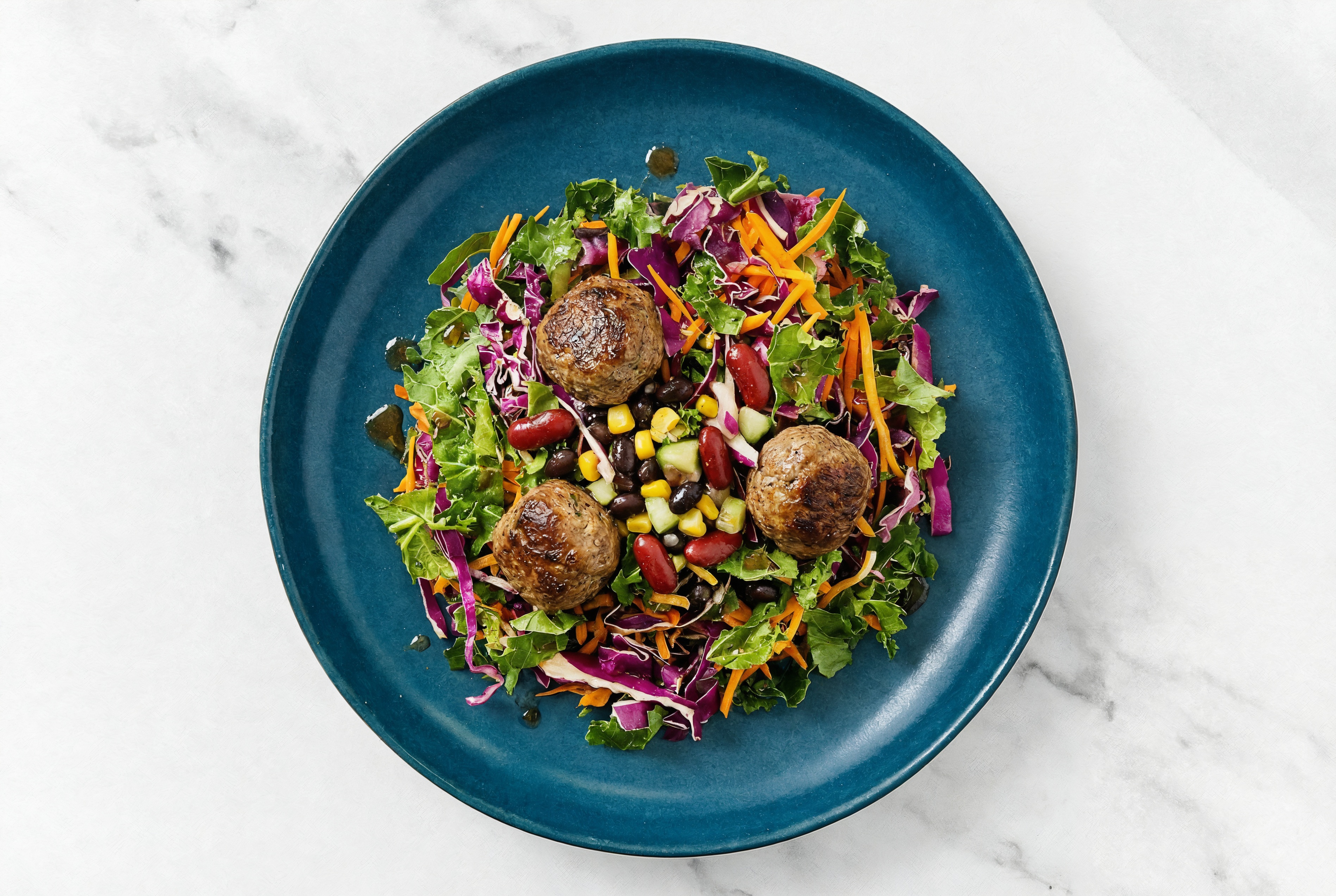 Balsamic Kale Salad with Meatballs & Black Beans