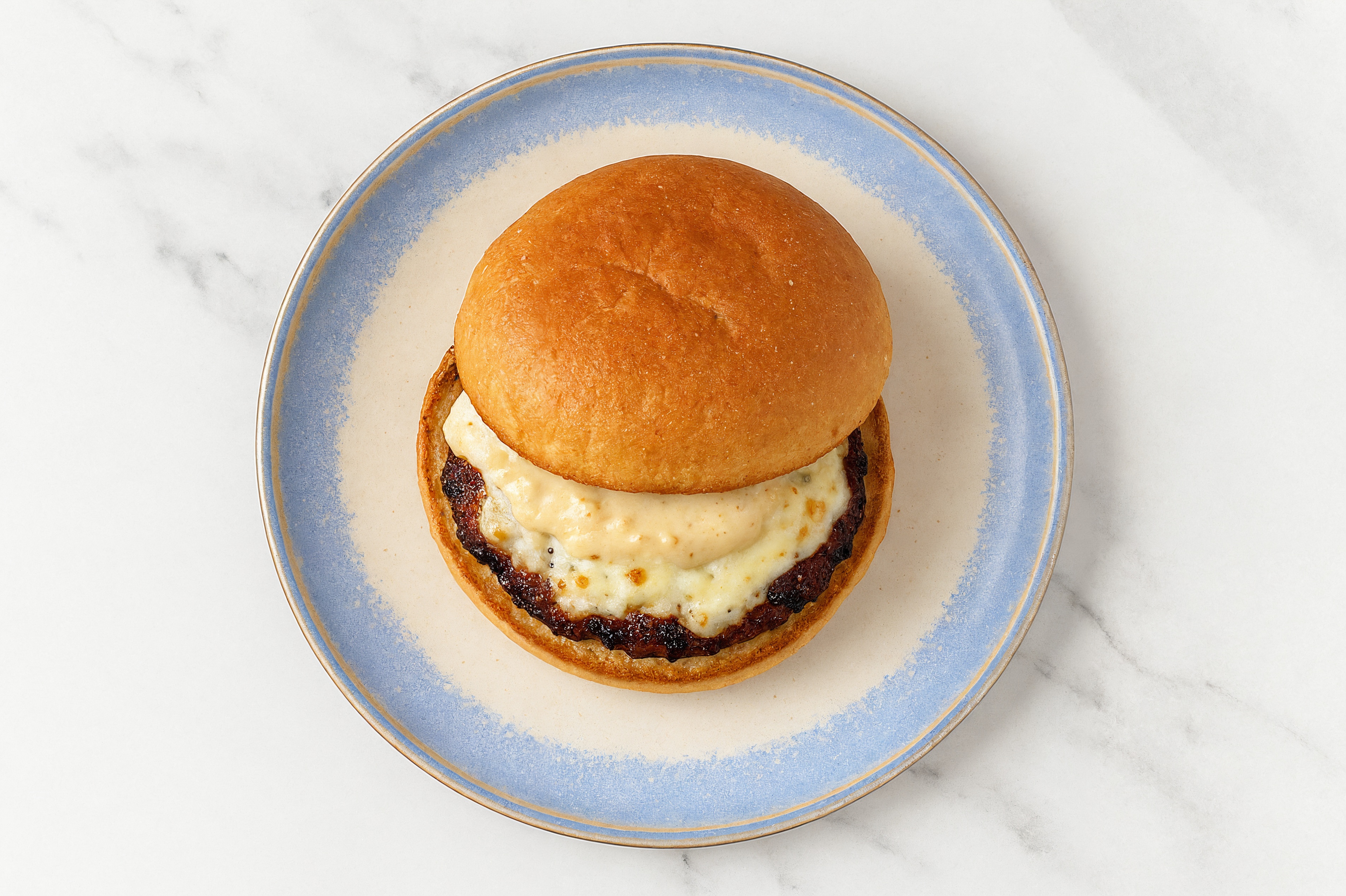 Mozzarella Beyond Burger on GF Bun with French Onion Sauce
