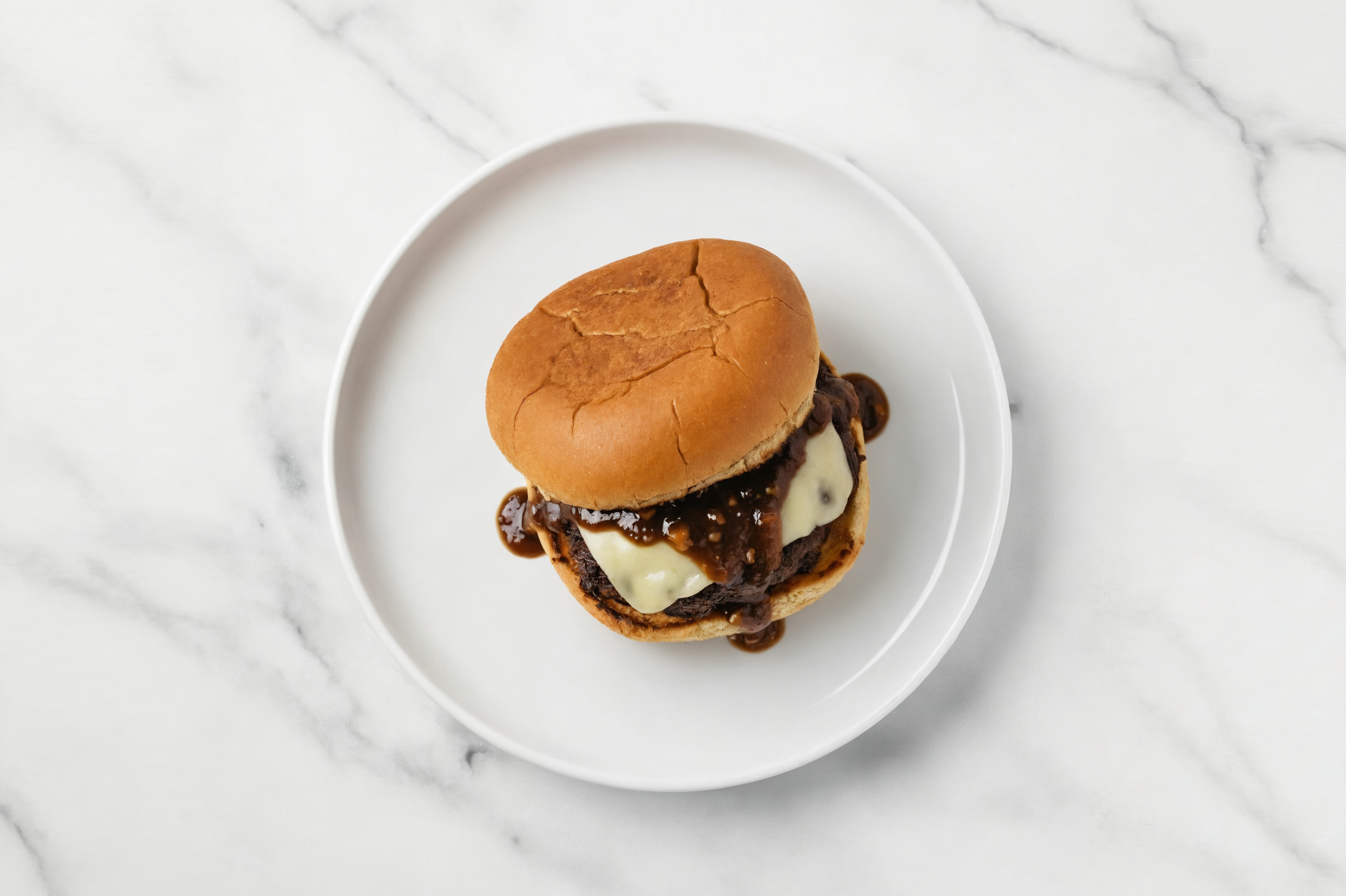 Lamb Burger on Gluten-Free Bun with Black Pepper & Gouda