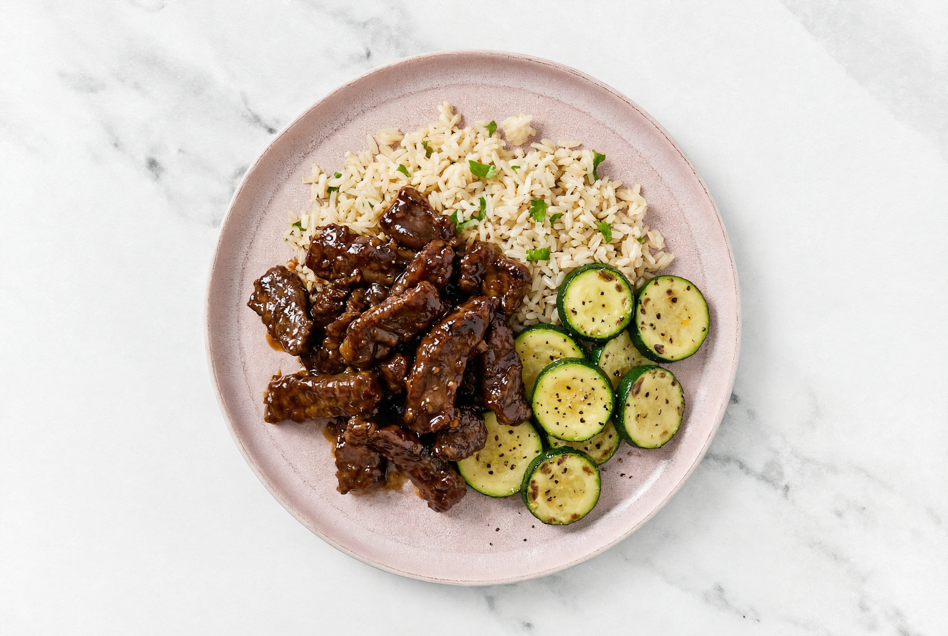 Herby Honey Garlic Beef with Zucchini + Rice