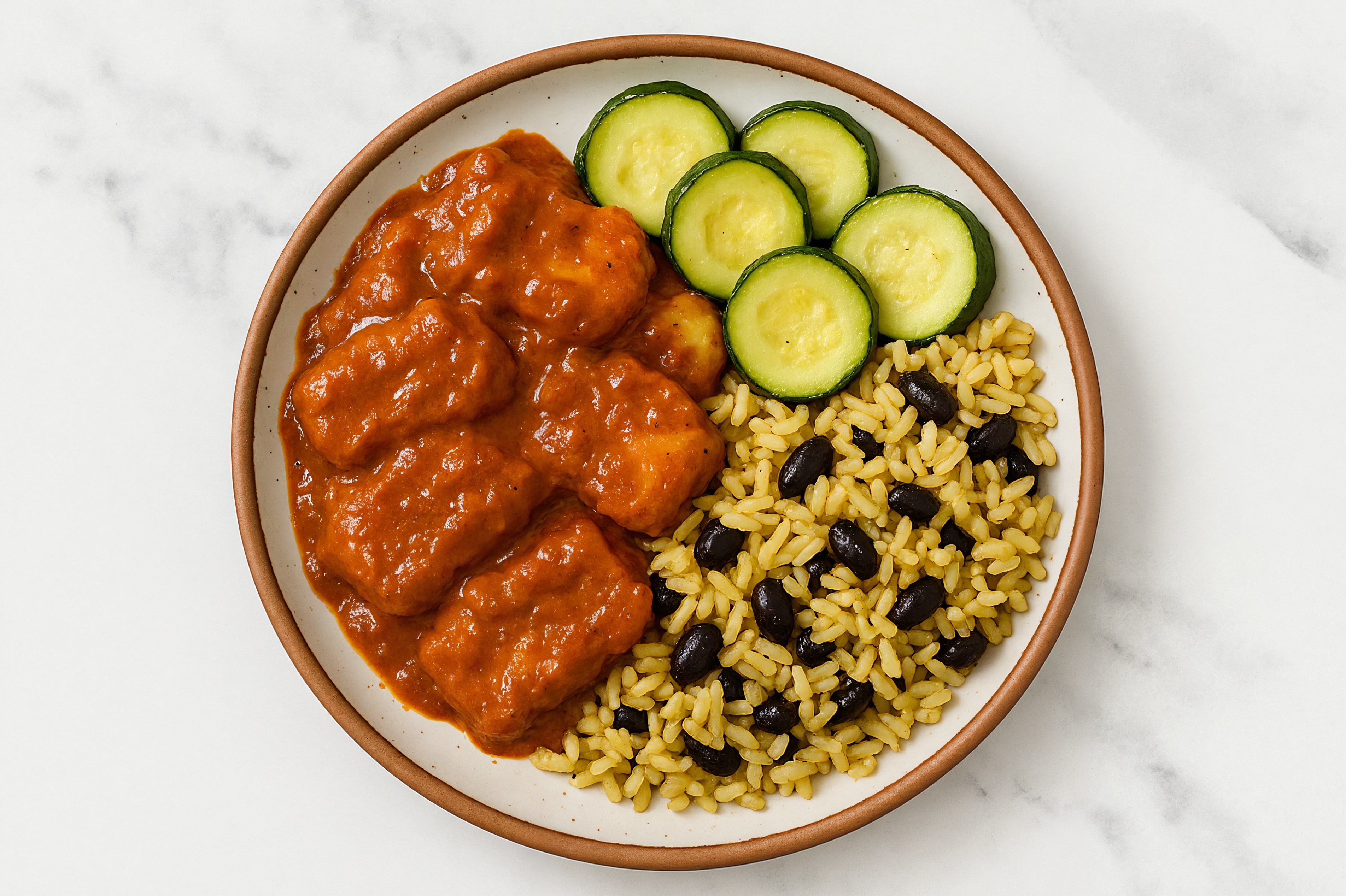 Crispy Tikka Masala Pollock Nuggets + Zucchini and Rice with Beans