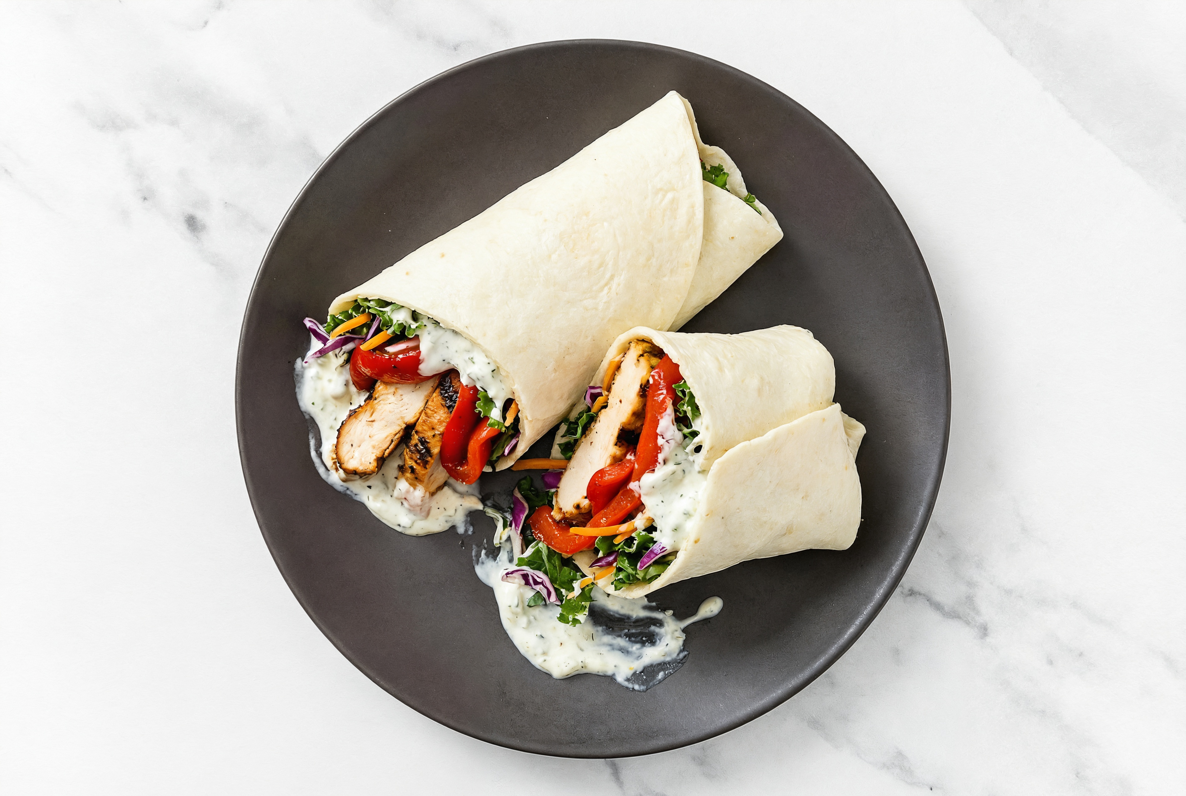 Tzatziki Blackened Chicken + Roasted Pepper Wraps with Rainbow Veggies