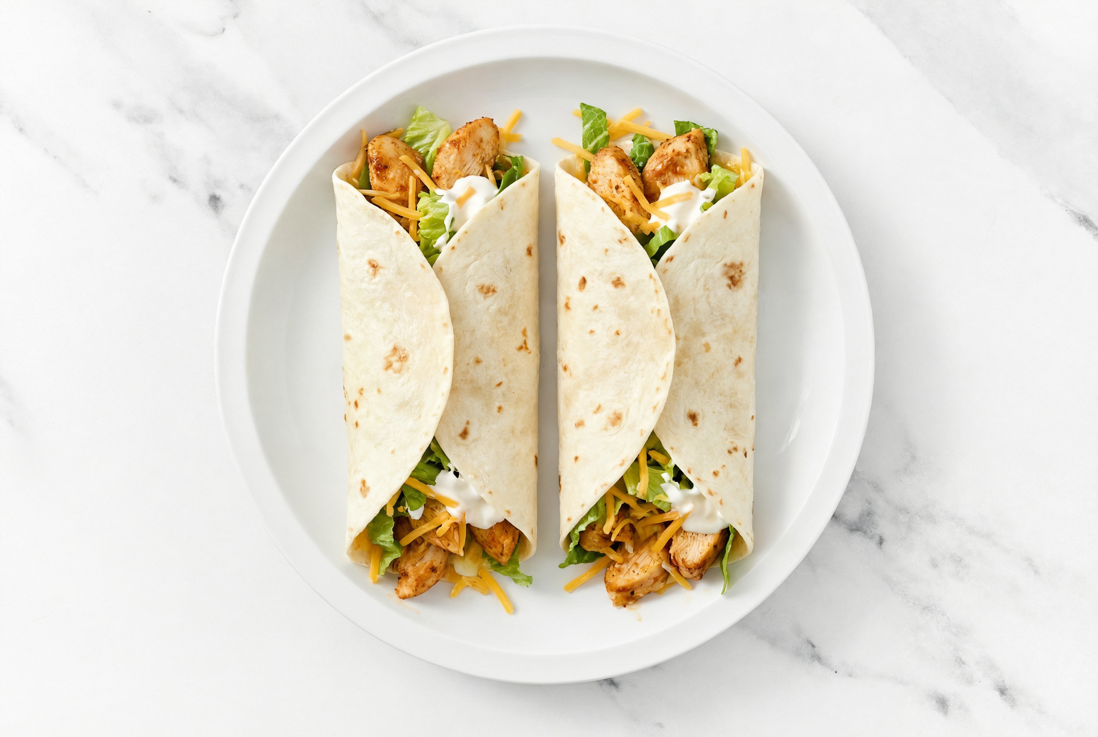 Chipotle Chicken Tacos with Shredded Sharp Cheddar Cheese